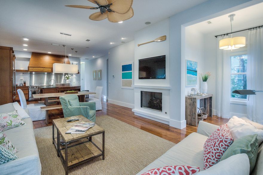 Exquisite home just steps away from the newly constructed Watercolor Beach Club and Seaside. The soothing tones throughout the home create the perfect ambiance for relaxation and rejuvenation. The living room and dining area open to the Chef inspired kitchen, which are perfect for entertaining with all the details in mind. It's truly any chef's dream and equipped with a large breakfast island with seating, a 48' stainless gas Wolf range stove with a grill, commercial exhaust system, wine cooler, and 36' Sub Zero refrigerator.