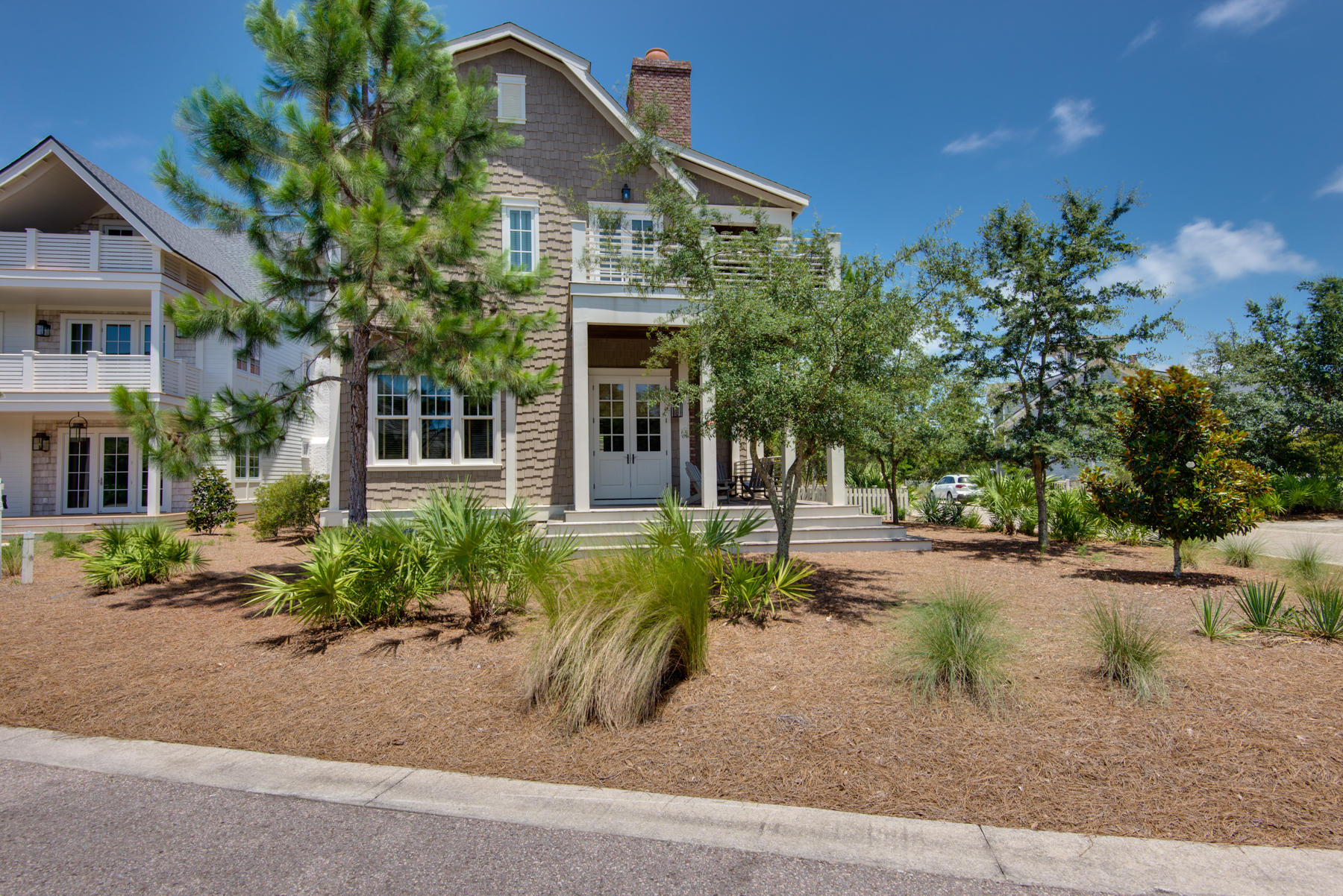 The Peninsula is a unique neighborhood in Watersound Beach featuring water views from the Gulf and Camp Creek Lake. Winding boardwalks to the beach take in the beauty and nature of Watersound. This custom built 6 BD / 6.5 BA Coastal Home is a must-see with Australian Cypress wood floors, Viking appliances, surround sound, and granite counter tops in the kitchen as well as bathrooms. The first floor has a spacious open floor plan encompassing the kitchen, dining, and living room. With an outdoor fireplace on each level, this home offers unique outdoor living spaces. A separate carriage house offers a private space with a full kitchen. Watersound Beach is a gated St Joe community that offers only the finest amenities to its owners.