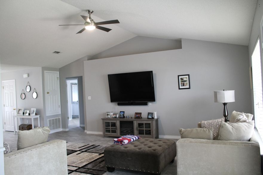 Immaculate 4 bedroom home in Mack Bayou Pointe Subdivision. This home has all the upgrades. Vaulted Ceiling, formal dining, driftwood grey ceramic tile flooring, marble counters throughout, stainless steel refrigerator. Large partially fenced back yard with raised entertainment deck overlooking the forest. Double car garage with Ryobi blue tooth connection opener that has 5 outlets for additional add on's. New Age Steel Garage Storage System and an extra refrigerator. Quiet neighborhood and a community pool offer the best in family living. Conveniently located only 1 mile North of Sacred Heart Hospital and close to Grand Boulevard, Restaurants, Silver Sands Outlet Mall and the beach! Make this your home TODAY!! Buyer to verify all measurements.