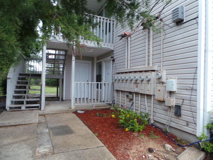 Easy Condo Living in Country Club Villas! This downstairs, one story unit features two bedrooms and one full bathroom, a living/dining room combo that has warm wood laminate flooring that leads to a kitchen with ample storage and work space, cooktop, dishwasher and refrigerator. Condo also features indoor laundry and NO lawn maintenance! Home is convenient to beaches, shopping, restaurants and more!