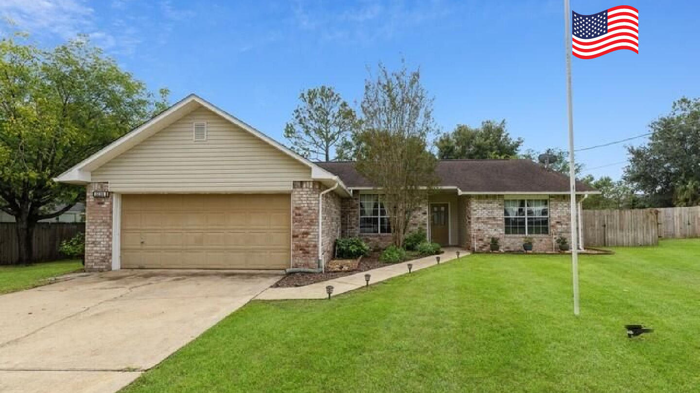 MOVE IN READY home on a large FLAT lot SOUTH of I-10 in Crestview! This spacious 3 bedroom 2 bathroom home has an open concept split floor plan that buyers have come to expect. NEW carpet in 2022 in all bedrooms and the living areas are all tile and wood look tile for easy maintenance. The large master suite has its own ensuite bathroom, complete with double vanity, his and her closets and tub and shower. The dining room is in its own defined space, yet open to the family room. The massive living room is complete with vaulted ceiling, plant shelves, fireplace, and sliding glass door leading to the back yard. The bright kitchen offers plenty of cabinets, a convenient center island, a pantry as well as a breakfast nook. There are two additional bedrooms located on the other side of the home as well as another another full bathroom. The indoor laundry room lead to the 2 car garage with tub sink and auto opener.
The large flat back yard is fully fenced and there is a brand new yard building with ramp for tools or yard equipment. Enjoy the open patio for grilling and entertaining while overlooking the the open backyard with mature trees for beauty and privacy. The had a new AC condensing unit installed in 2020 and new roof was installed in 2011. Schedule your showing today as great property will not last long!