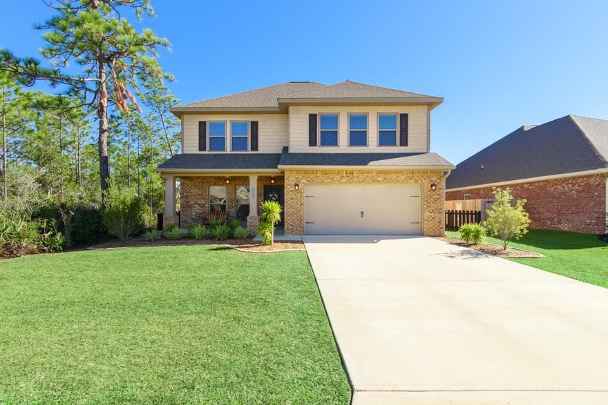 Built in 2018 and impeccably maintained, this 4 bedroom and 3.5 bathroom home abuts protected green space providing wonderful natural backyard views. The kitchen comes equipped with granite counter tops, brand new subway tile backsplash, breakfast bar, stainless steel appliances, electric smooth cooktop range, fridge with ice and water dispenser, built-in microwave and a pantry. You'll enjoy the open floor plan which allows a nice flow from the kitchen into the dining area and downstairs living room. The master suite is conveniently located just off the kitchen and has a walk-in closet and ample natural light with 4 windows. The master bathroom has a tiled walk-in shower, double granite vanity, water closet and linen closet. Upstairs you will find a second living area (20x17). This area ma