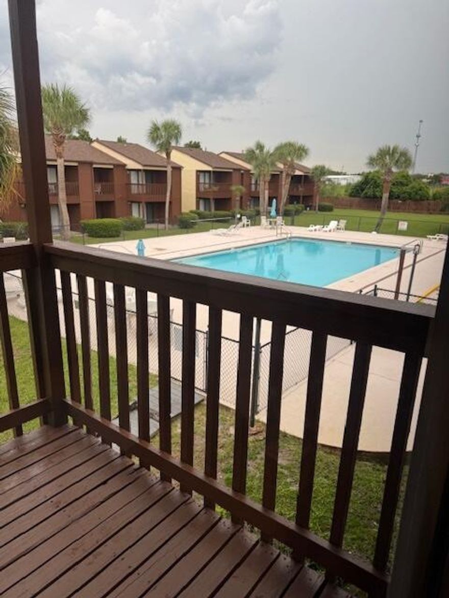 Experience low maintenance coastal living with this beautifully remodeled and fully furnished 2-bedroom, 2-bath townhome in Beachwalk Condos, ideally located on the west end of Panama City Beach. Recent updates include luxury vinyl plank flooring, updated appliances, and renovated bathrooms, giving the home a fresh, modern feel. Step outside to your covered patio, just moments from the community pool, perfect for relaxing after a day at the beach. This unit is rental-ready with short-term rentals allowed, making it a perfect investment property, second home, or vacation retreat. One of the best features of Beachwalk is its convenient access from Highway 98, so you can avoid bumper-to-bumper traffic when coming and going. Plus, you're just a short stroll to Beach Access 72.
