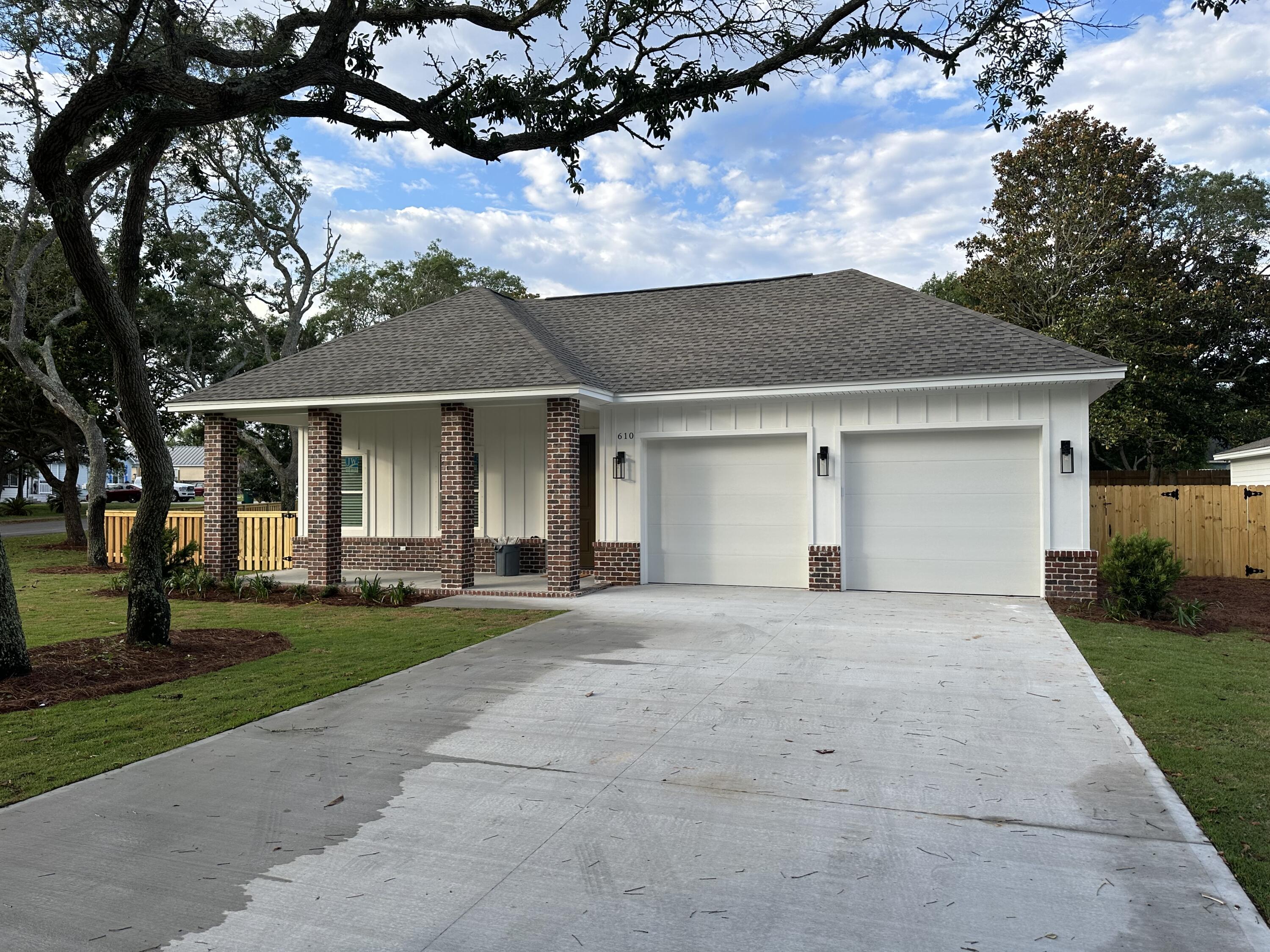 This beautiful new home features 4 bedrooms, 3 bath has all the boxes checked! Be the first to rent out this rare find. No carpet in this home, luxury vinyl plank flooring throughout, stainless steel appliances, granite countertops and window treatments, just to name a few. The kitchen is open and airy and overlooks the living room and beautiful back yard, which makes for perfect for entertaining. The substantial master bedroom, with a large walk in closet and a master bath that features a double vanity, a garden tub, a walk-in shower and a separate water closet. The guest bedrooms and baths are spacious. A new washer and dryer are included as well as a 2-car garage that features a car charger for those that have an electric vehicle.