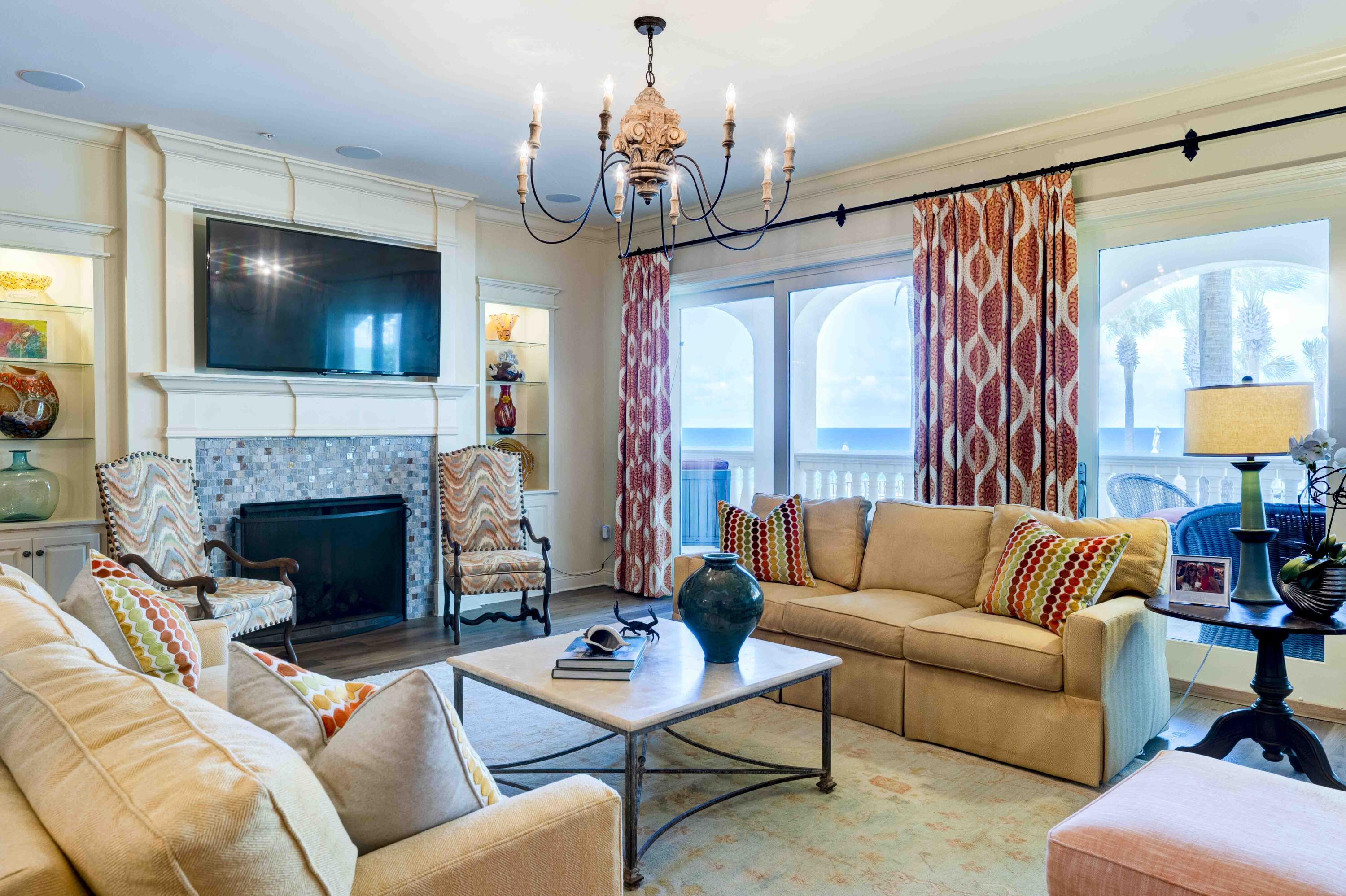 Welcome to C101, step into the largest three bedroom three and one half bath condominium home, in Bella Vita on Blue Mountain Beach boasting over 2735 square feet with 530 square feet of veranda with breathtaking views rising above the gulf, sparkling pools and stunning piazza. Rarely does a condominium home in Building C with only 9 residences become available. Beautiful azure blue Gulf waters unfold before your eyes drawing you out to the terrace which spans the breadth of the residence. This immaculate corner condominium home with fireplace and premier media is a highly coveted first floor walk out and features over $500K in furnishings and upgrades including impact glass doors and windows, and front door installed in 2024, as well as two HVAC systems installed in 2024. C101 enjoys a separate storage unit right outside the front door for stowing away extra beach items and there is storage under the building. The C building is contiguous to the beach walk over, pools, steps away from the Sunset Deck for grilling, and adjoins one of the designated spaces for pets. The Primary Bedroom lets on the veranda and features two walk in closets and the Primary Bath is graciously sized with dual vanities, soaking tub, separate shower and water closet and linen closet. The quality interior delineations throughout include solid surface flooring, custom gas fireplace, kitchen designed by Linn's Prestige Kitchen with custom cabinetry including a high-end appliances. The resident chef will enjoy the Dacor 6 burner gas cook top, double ovens, Bosch dishwasher, Kitchen Aid ice maker, and Sub Zero Refrigerator. The private En-suite Guest Bedrooms are very large and comfortably accommodate guests. There is a separate laundry room with built in cabinetry and a separate Powder Room.
Gated Bella Vita in Blue Mountain Beach comprises a total of 48 residences with 365 feet of beach on approximately 6 acres, a Great Hall with conversational seating, a Library, porte cochere and an excellent Fitness Center to encourage work out enthusiasts to stay fit while at the beach. Convenient to Bella Vita on Blue Mountain Road is the 30A bike path, coastal towns, bike shop, restaurants, health food store, donut and ice cream shop and shopping. We invite you to discover Bella Vita 30A's best kept secret where pride of ownership is reflected in attention to detail in the quality maintenance of the buildings, the landscaped grounds, parking, and amenities. Plug in and start playing and enjoy carefree life at the beach in C101! Bella Vita....is the Beautiful Life