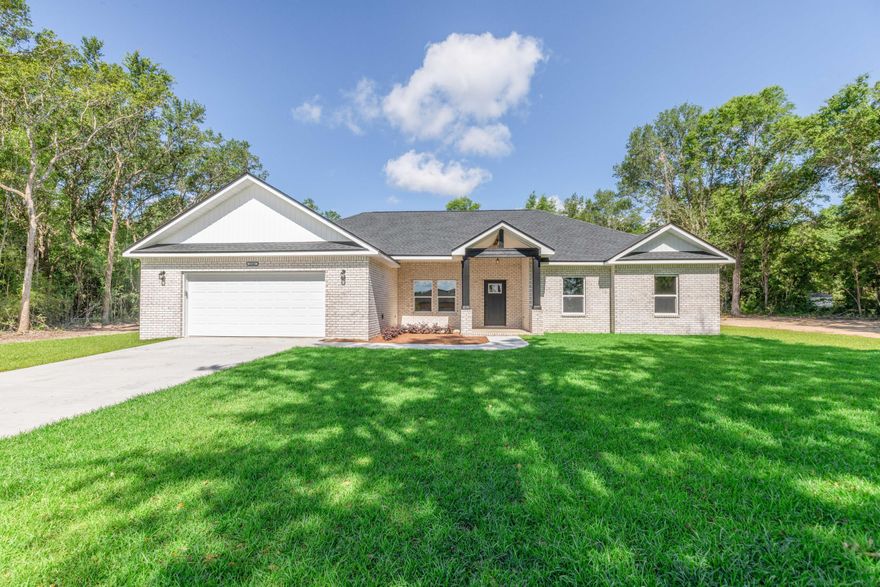 ***NEW CONSTRUCTION HOME IS NOW COMPLETE*** on 1.01 ACRE LOT in Crestview!!! This 4-bedroom 2-bathroom 1947 sq ft brick front home with vinyl siding boasts an open concept split floor plan that buyers have come to expect. This home will have beautiful finishes to include: LVP flooring throughout (no carpet), granite counter tops in the kitchen and bathrooms, all wood cabinetry, ceiling fans throughout, stainless steel appliances (refrigerator, smooth top range, microwave, and dishwasher and corner pantry. This plan offers a large living room, formal dining room w/ tray ceiling, and open concept kitchen with  massive island and breakfast bar. Enjoy the large master suite with tray ceiling. Master bath offers huge closet, double vanities, water closet, linen closet, and shower. On the opposite side of the home, you will find a three additional spacious bedrooms and a full bathroom. The home will have a spacious 2 car garage that leads to an interior hallway that leads to a mud room / laundry room. The exterior of the home home offers dimensional shingles, covered front porch in both the front and back yard. Don't forget the MASSIVE lot size at nearly 1 ACRE. This lot has been cleared with a 10-15 foot tree line around the property full that ultimate feeling of privacy. You will have plenty of room to add a yard building, boat storage, RV storage and more.... Estimated completion of this home is Spring of 2025. Buyer may have choice of colors depending on when the home goes under contract.
Don't miss out on your opportunity to own your NEW dream home on a large piece of land at an affordable price. Schedule your showing today!

