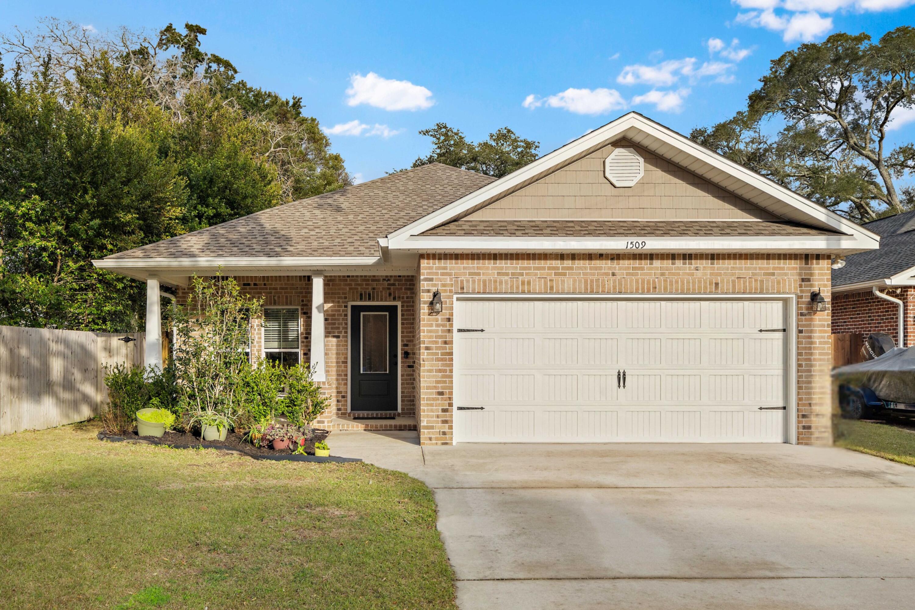Seller offering $5K toward Buyer's Closing Costs with acceptable offer! All-brick, move-in-ready 4-bed, 2.5-bath home in Bluewater Bay! This single-story home boasts a smart floor plan with front formal dining room and open kitchen/great room. The split-bedroom design enhances privacy for the primary suite. The modern kitchen features quartz counters, soft-close drawers, an upgraded GAS range, and an oversized breakfast bar. Enjoy 9' ceilings, crown molding, and a TANKLESS water heater. The large fenced backyard and screened porch offer great outdoor space. NO carpet for easy upkeep! No HOA, zoned for top-rated Niceville schools and specifically for BLUEWATER BAY ELEMENTARY less than a mile away! This gem sits in a quiet, low-key area, yet residents love the friendly, neighborly feel.