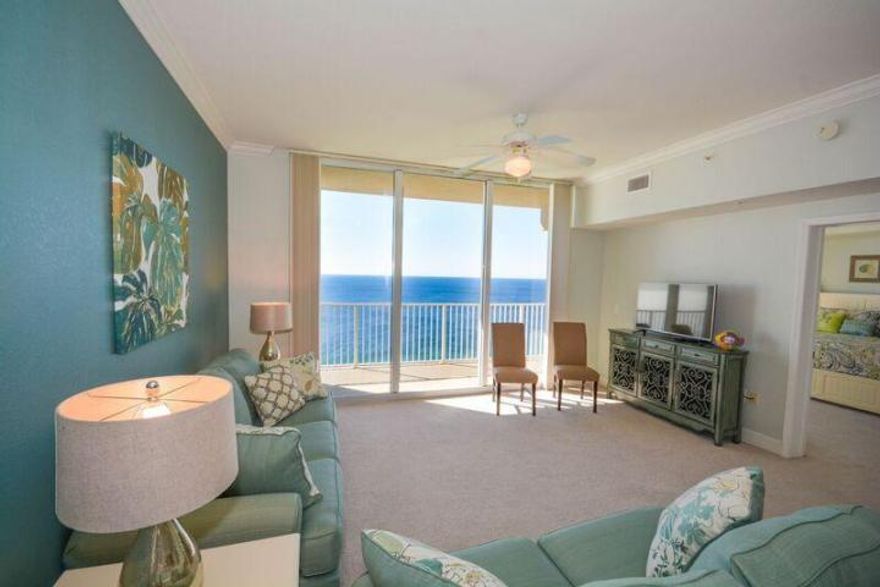 This 28th floor Penthouse condo has been recently renovated with new paint and furnishings thruout. It features a unique and spacious floor plan with the living room and master bedroom opening onto a 30' wide x 6' deep gulf front balcony. Other features include a bunk room with closet and access to the second bath. This penthouse offers 9 1/2 foot ceilings with crown molding, travertine floors, a fully equipped kitchen with stainless steel appliances, a double door refrigerator with water and ice and large breakfast bar. This low priced condo is being sold as a turnkey rental investment. Similar plans have grossed over $35K annually! It is nicely decorated in updated relaxed 'coastal living' dcor. Tidewater Beach Resort is ideally located at the West end of Panama City Beach,just 15