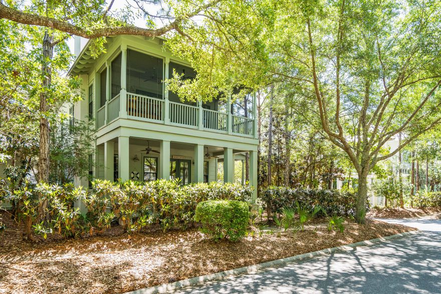 Nestled on a 8700 sq ft corner lot in Watercolor, this lovely 4 bed/4 bath home is just steps away from Camp Watercolor. This meticulously maintained, one owner home, has never been rented but has strong rental projections. The shaded outdoor patio has a brick fireplace with a grilling area for outdoor entertaining and there is over 1300 sq ft of covered porches to relax on.  The first floor has open floor plan kitchen/living with a fireplace, window seating and 3 covered porches!  There is one bed/bath on the first floor. The second floor has additional beds/baths, a small nook that makes for a great office and 2 screened porches. The master suite includes a private screened porch with daybed and ensuite bath. There is pre-approval from DRB to build a Carriage House on this large lot.