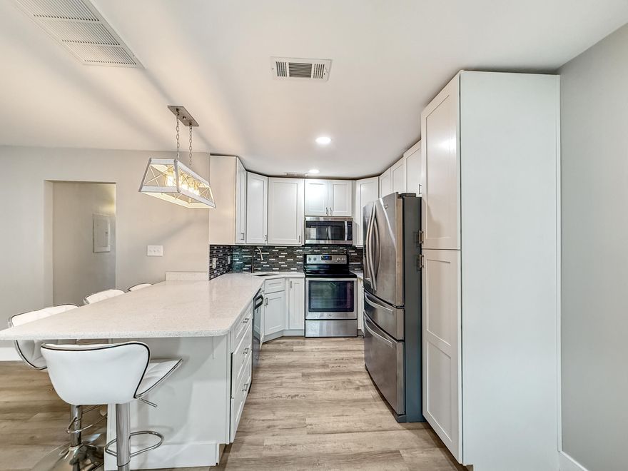 FRESHLY RENOVATED, BEAUTIFULLY PRICED!Step into one of Gulf Breeze Proper's most desirable condo communities, where comfort, convenience, and coastal living come together. This well-cared-for home has been lovingly maintained by the same owner for the past 19 years and is move-in ready with stylish upgrades throughout.The updated kitchen features sleek countertops, stainless steel appliances, and an abundance of cabinetry--perfect for entertaining or everyday living. The spacious living and dining area flow seamlessly onto your private balcony, where you can enjoy peaceful views of the shimmering community pool. Whether it's morning coffee or unwinding in the evening, this outdoor space will quickly become your favorite retreat. Designed with low-maintenance living in mind, this condo offers a newer AC/HVAC, water heater, and a roof that's only four years old. Inside, you'll appreciate the convenience of your own stackable washer and dryer a rare luxury, as most units rely on the shared laundry facilities. Indulge in your jacuzzi tub, offering the perfect blend of comfort and luxury. All appliances convey, making this a truly turn-key home.

The community itself is beautifully maintained with lush landscaping, sparkling pool, and even on-site parking for your boat. HOA fees of just $425/month cover water, sewer, trash, basic cable, and grounds keeping, giving you peace of mind and simple budgeting. Best of all, there are no outstanding association assessments. 
Property taxes for 2024 are $419.63/year and current owner pays $800/year for homeowner's insurance making this home really affordable.

Location, Location, Location!

Perfectly situated off Highway 98, you're blocks away from top-rated Gulf Breeze schools, Publix, City Hall, the library, Shoreline Park, and an array of local dining and shopping options. Outdoor enthusiasts will love the nearby hiking and biking trails, dog park, baseball fields, and easy access to pristine sandy beaches. You are minutes away from Pensacola Beach. The community is ideal for walking or biking, with shady oak trees, sidewalks, and traffic-calming speed bumps throughout.

With no short-term rentals and no dogs allowed, this quiet, friendly neighborhood offers the kind of stability and peace that makes it a true hidden gem along the Emerald Coast.

Don't miss this opportunity to own a beautifully renovated condo in the heart of Gulf Breeze Proper your key to effortless coastal living!

Warrantable condo making financing options available! 
