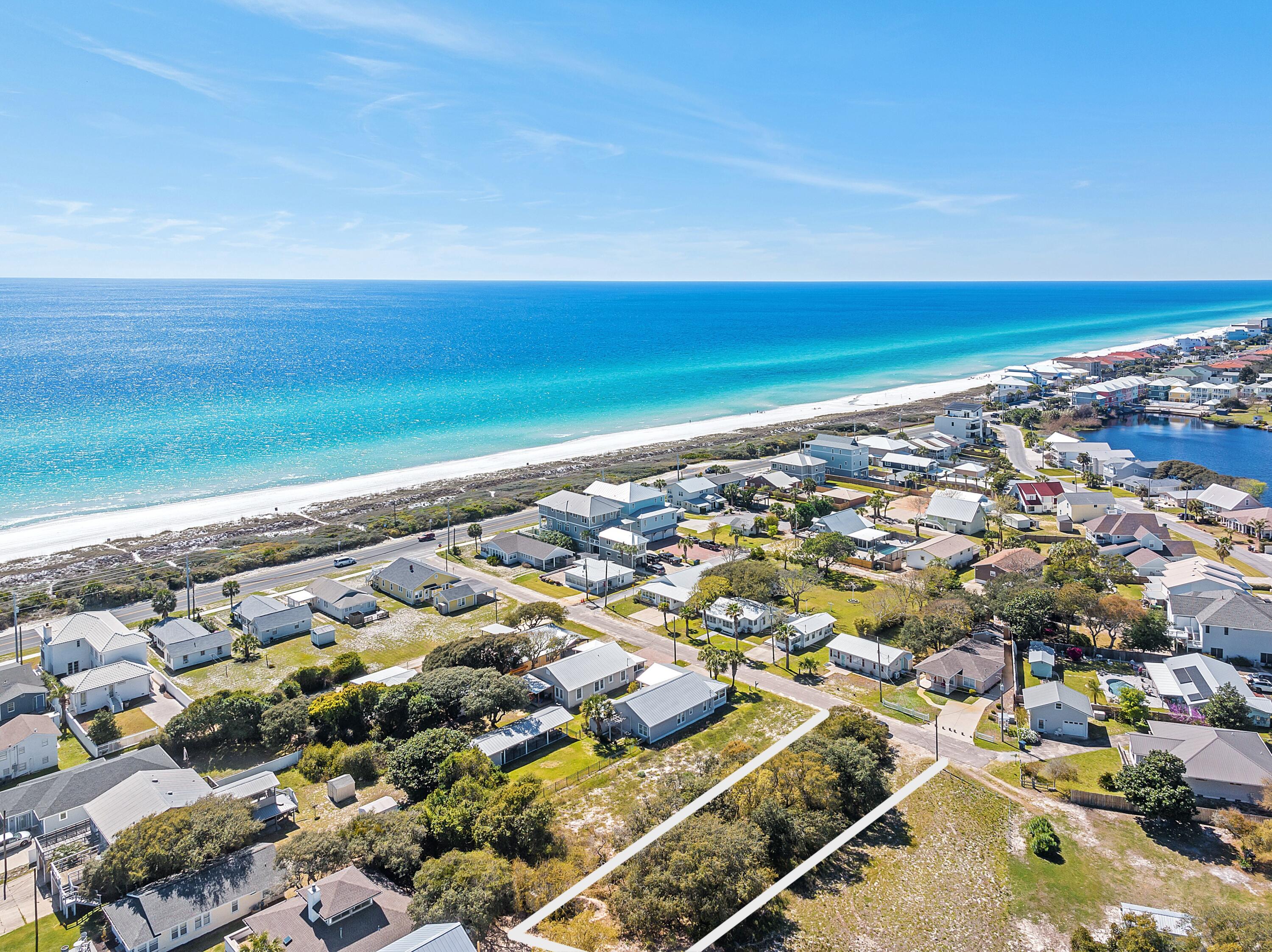 One of very few remaining buildable lots in the exclusive Sunnyside neighborhood, with tap and impact fees already paid. Boasting 3,000 feet of private deeded beach shared by less than 100 total homesites, this neighborhood is one of the most private, most secluded gems along the entire Emerald Coast of Florida. The lot itself is situated just steps away from the world-famous sugar white of the Emerald Coast. No HOA dues, no build time requirements, no design requirements. Buy one of the last remaining lots in one of the most sought-after neighborhoods of the Panhandle and build the beach house of your dreams. Enjoy unparalleled beach privacy while also being a short car or bike ride away from all the entertainment, shopping, and dining that Pier Park and East 30A have to offer.