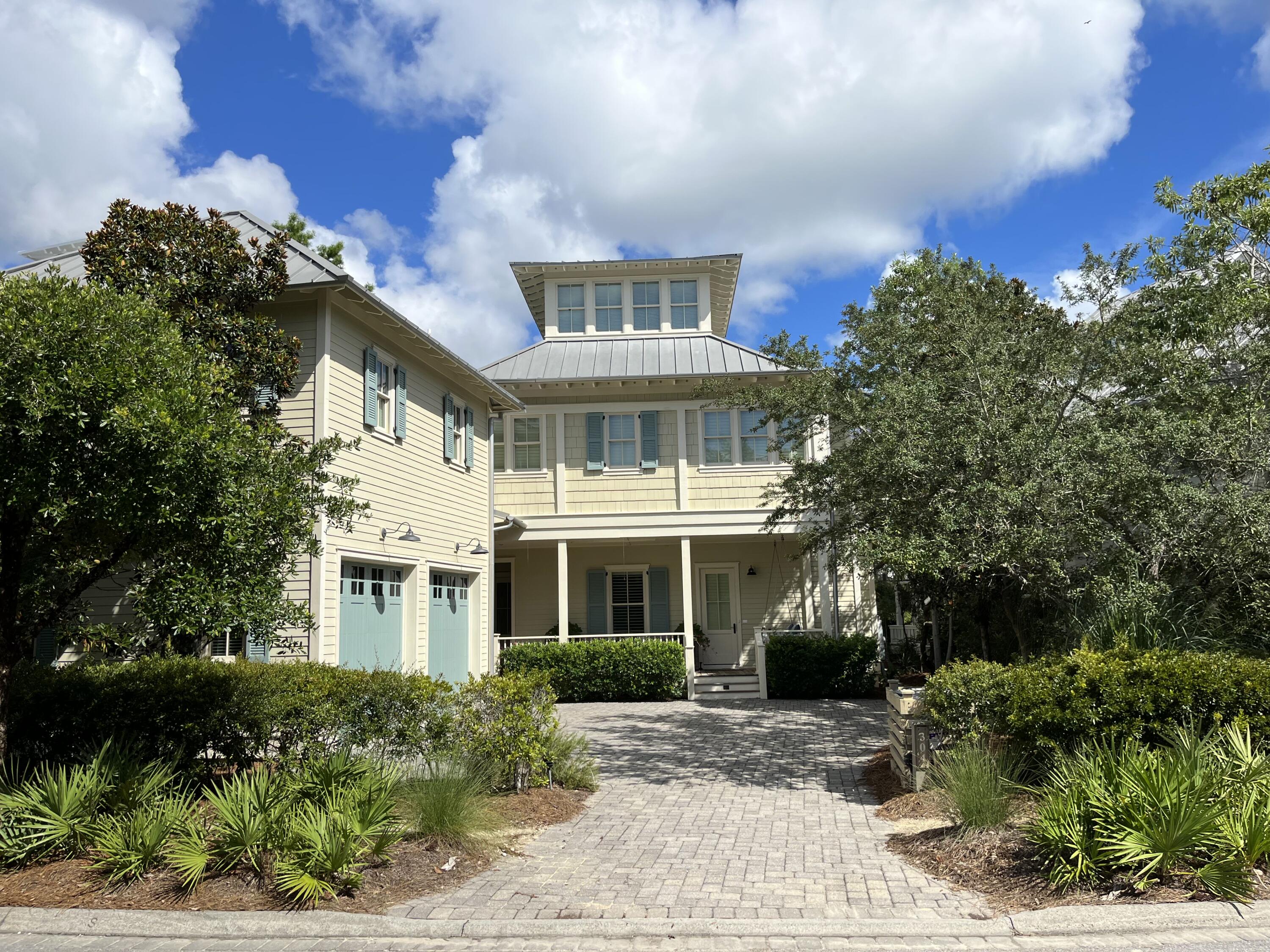 Welcome home to what gulf coast living is all about - a luxurious Florida getaway nestled into what the street name describes; a quiet cove with one of the most amazing views found in Watercolor - Western Lake from all levels. Sophisticated, yet comfortable, this extraordinary home has a spacious 3-level floor plan WITH elevator.  Fully furnished and comfortably sleeps 10-12. There is even a detached carriage house suite over 2-car garage. So many separate living areas, inside and out, including screened porches on two levels. Master suites on two levels each with amazing baths. So many wonderful features: Brazilian hardwood floors, surr-sound, whole-house generator, 3 tankless WH, fully equipped kitchen. Be sure to visit the 3rd floor office/sitting room with amazing views!