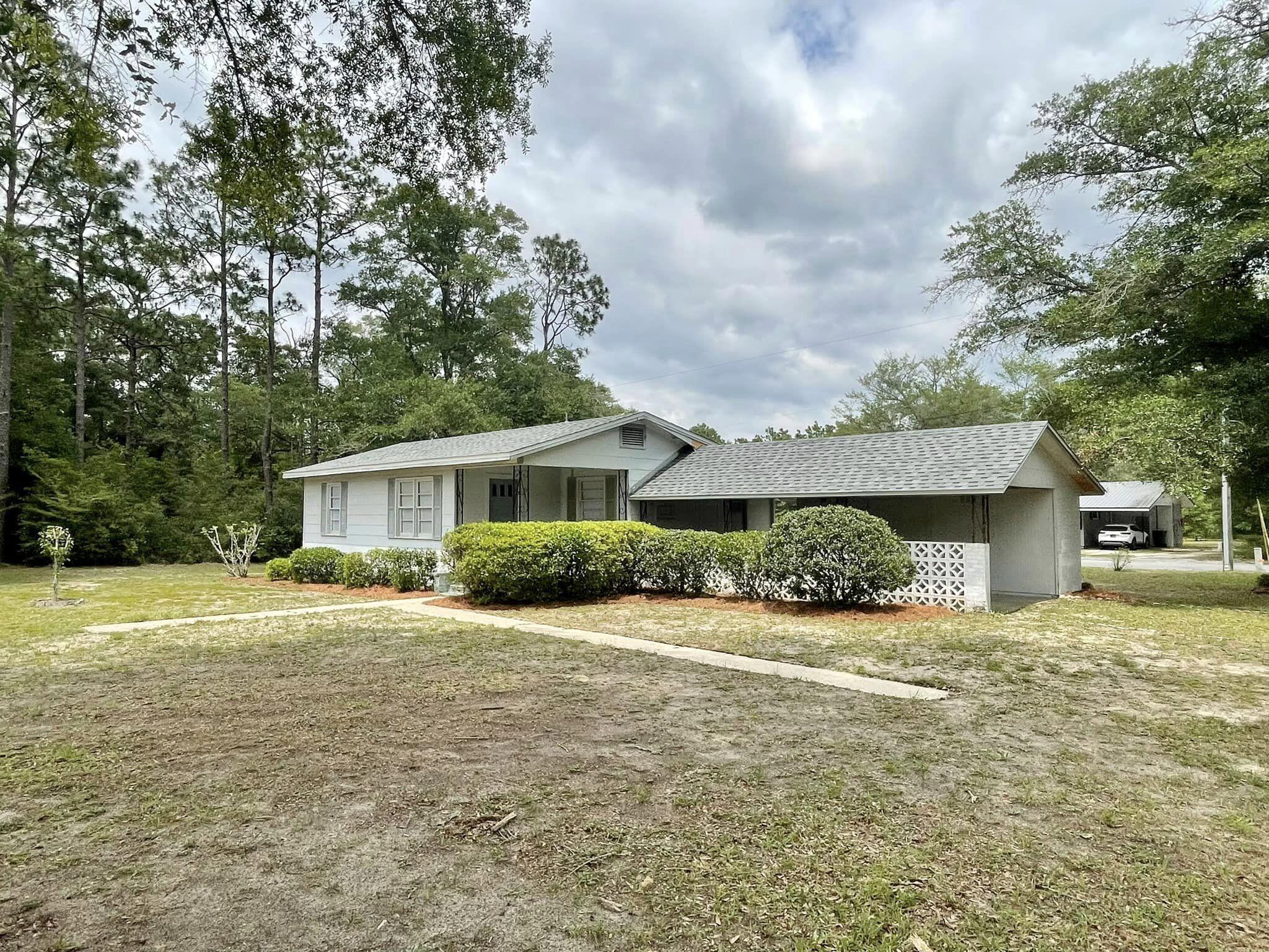 Quaint Florida cottage that lives larger than the numbers show! Open floor plan between the living room and kitchen, bedrooms are on one side of the home with full bathroom next to them. One of the most amazing features to this home is that there is road frontage on three roads and woods on the third side- so it gives you a country feel while being in the city limits! It does not get any more conveniently located then this! Application requirements are background check and credit check (for everyone 18 and over), credit score minimum of 600, household income of $3750 and one year consistent employment unless you are moving here for employment and can provide job offer letter!