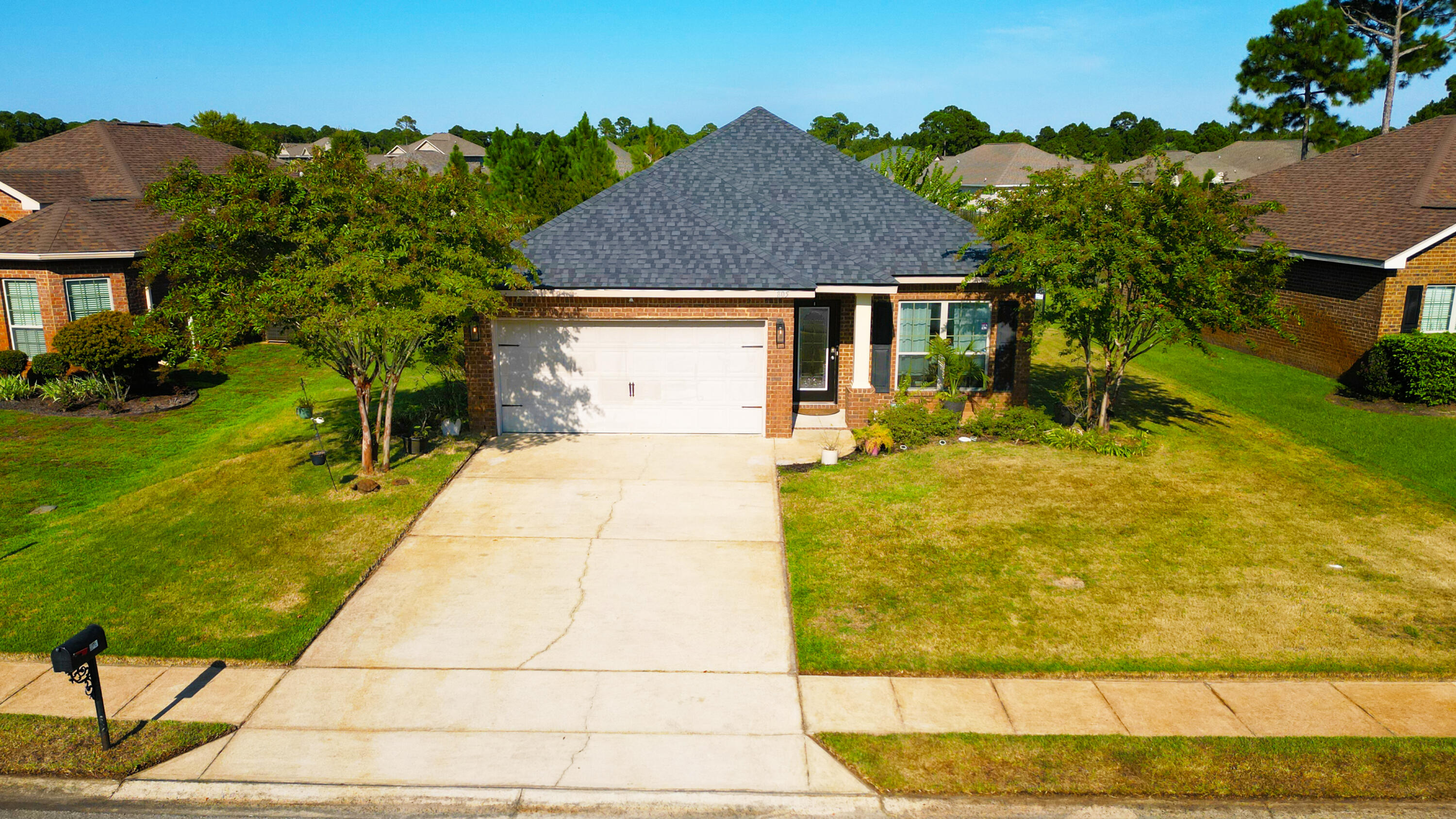 Welcome to Driftwood Estates, where charm meets convenience! This beautifully maintained 3BR/2BA home with an additional flex space offers one of the community's most desirable settings--overlooking a pond in the rear and facing another green space with water views in the front.Step inside to an open layout highlighted by graceful archways, crown molding, and tile floors throughout. The updated kitchen features quartz counters, a large island, coastal-inspired backsplash, and ample cabinetry, flowing seamlessly into the dining and living areas with recessed lighting and an electric fireplace.The spacious primary suite boasts a tray ceiling and spa-like bath with dual quartz vanities, soaking tub, and walk-in tiled shower. Two guest bedrooms are generously sized, and the bonus room offers flexibility as an office, media room, or formal dining.
Enjoy tranquil Florida living from the enclosed back patio, fenced yard, and direct pond access for fishing or relaxing. With a two-car garage, new roof, laundry with storage, and manicured landscaping, this move-in ready home checks every box!