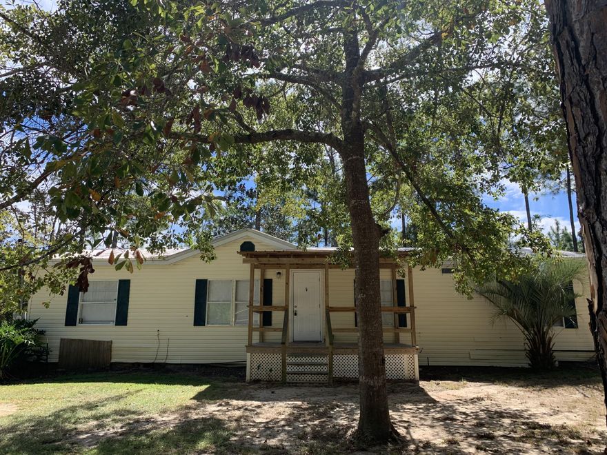 Located just 2.5 miles from Ed Walline Beach access, Gulf Place and all 30A has to offer. Bring your boat!  Only 1.5 miles from Cesna Landing boat ramp and 3 miles to the 393 Boat ramp. No HOA. This fixer upper is on .3 acres and has alot of potential.