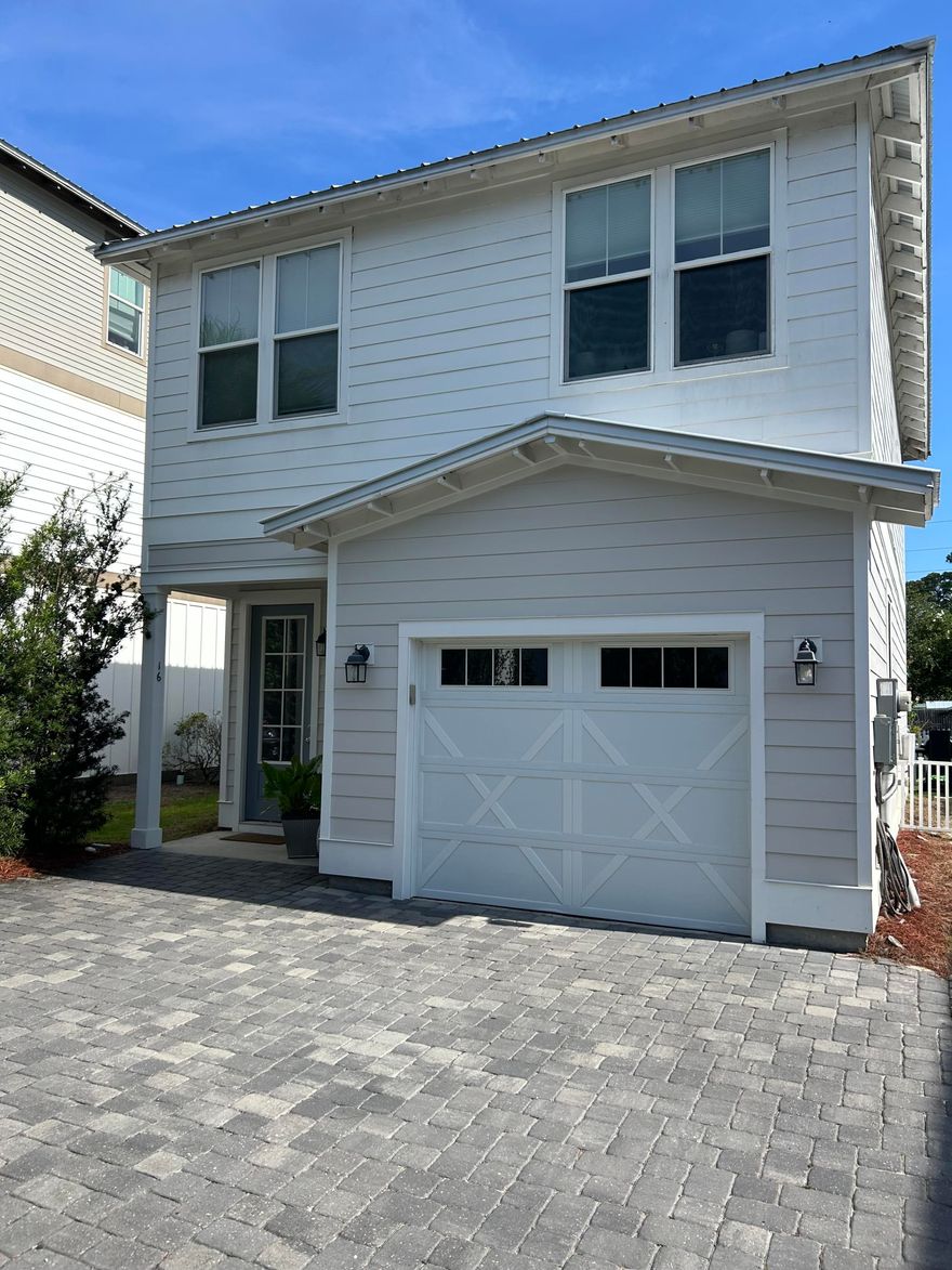 Welcome to Lighthouse Pointe, a quaint 18 home community one block to the bay!  This location is close to schools, beaches, restaurants and all that 30A has to offer.  This open floor plan has 1294 sq ft, 3 bedrooms, 2 full baths, 1 half bath, patio and single garage.  The main floor has 9' ceilings, luxury vinyl flooring throughout main living areas, a large quartz countertop in kitchen with counter seating area and wonderful dining area.  Second floor has primary bedroom with beautiful double sink master bath, designer tile floor and floor to ceiling tile in large walk in shower. Additional 2 bedrooms with double sink secondary bathroom and laundry room complete second floor.  This home is graced with natural light and views of the bay from the second floor primary bedroom.