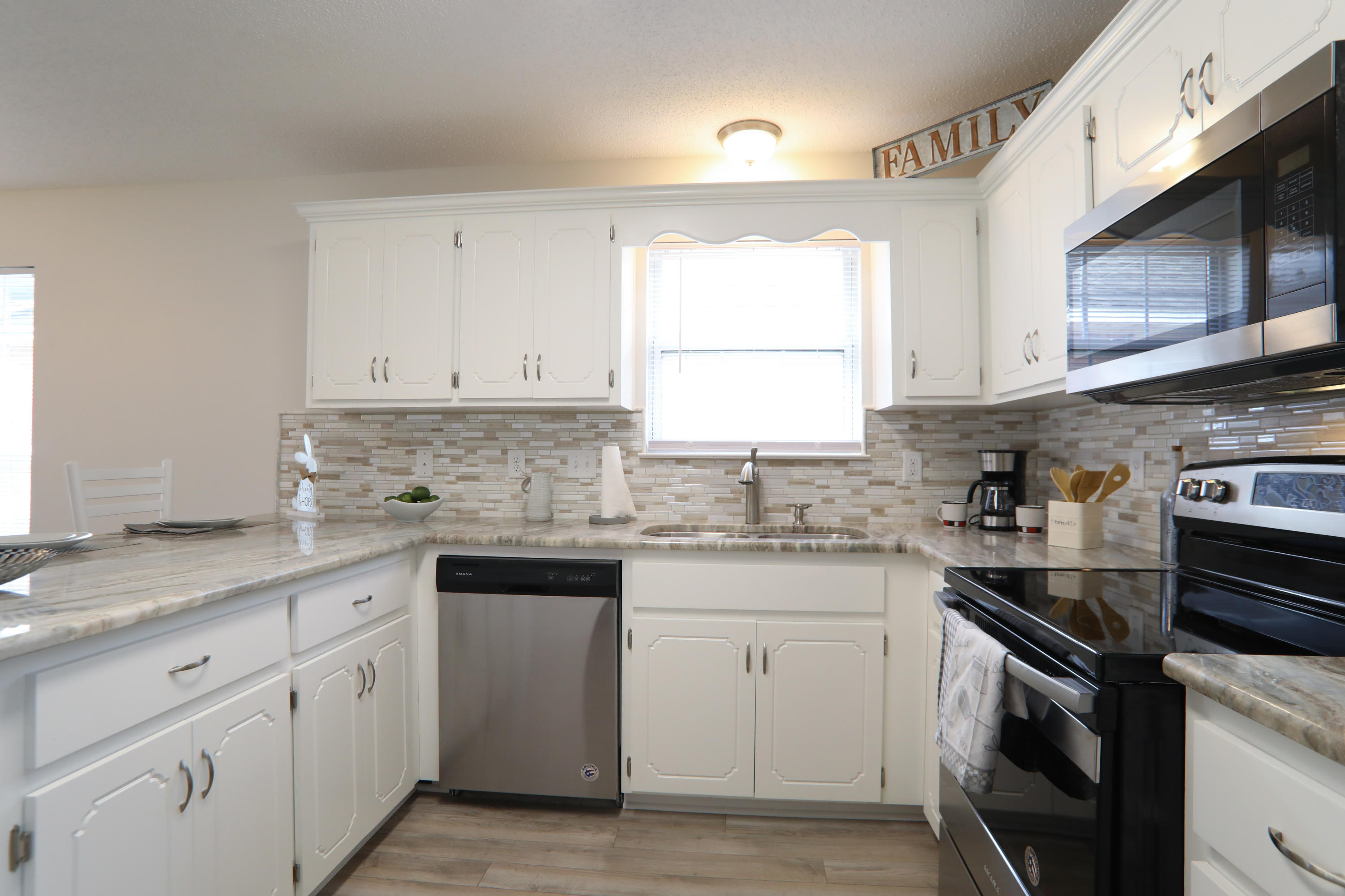 New Roof--Don't miss this newly updated home in Bluewater Bay. 3 bedrooms 2 baths with new granite counter tops, new stainless appliances,new interior paint, new flooring throughout, new lighting, and more. Perfect home for someone looking to downsize or buy their first home. Super convenient to shopping and Mid-Bay Bridge.