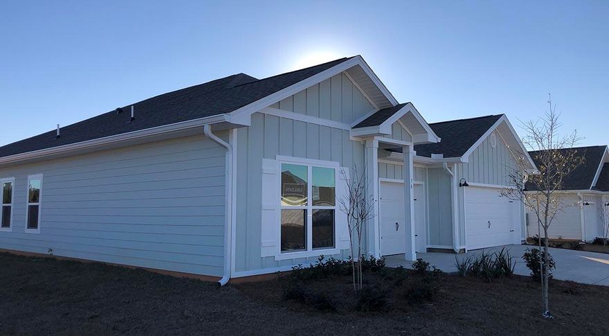 The Camden plan is a 4 bed, 3.5 bath, 3 car garage home in Hammock Oak Estates. With an appointed dining room, a large study, 4 bedrooms as well as an additional garage for a third car or golf cart - this home is full of space! Just off the foyer, there is two bedrooms with a shared bath that has a double sink vanity and shower/tub combo. Bedroom 1 is situated off the breakfast area with a spacious bath and walk-in closet. The homes interior features are EVP flooring throughout the home.  Beautiful crown molding in treys are in the foyer, dining room, large family room and bedroom 1. The kitchen has a center island with a sink, quartz countertops, plenty of cabinetry for storage.