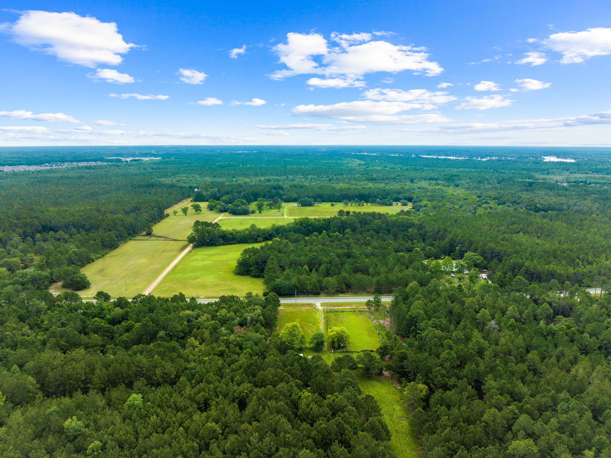 Experience the ultimate in privacy and tranquility with this stunning 90-acre tract nestled in the heart of Freeport, Florida; one of the last remaining large tracts found on the desirable County Hwy 83A (Bayloop Rd.) This expansive property offers endless possibilities for development, recreation, or conservation. Enjoy breath taking views, cleared pastures, and abundant wildlife, all just minutes from the charming town of Freeport, some of the World's Most Beautiful Beaches, and waterways of the Choctawhatchee Bay. With its prime location, this tract is perfect for investors, developers, or those seeking a serene retreat. Don't miss out on this rare opportunity to own a piece of paradise in one of Florida's most desirable locations. Contact us today to schedule a viewing and make your vision a reality.