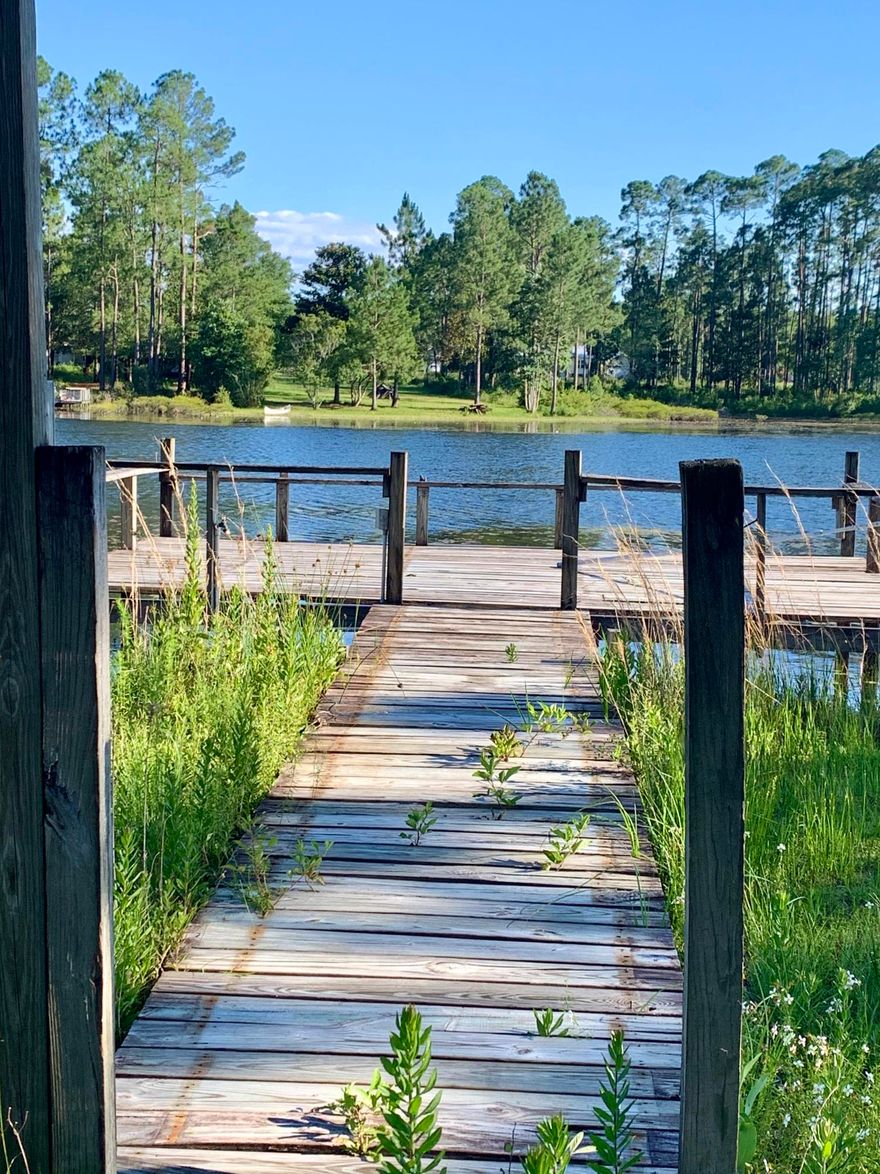 Gorgeous double lot on the lake, enjoy the views, property needs work but has tons of potential. Dock,workshop, shed and carport. Property has utilities in place.