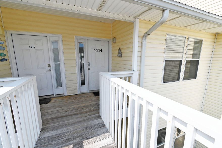 This spacious one bedroom unit, equipped with hall bunk beds, is an ideal opportunity for those considering a second home or vacation rental.  Located in Beachwalk right by the front entrance, and overlooking the main pool that also has three hot tubs. Great rental revenue already this year so far at $20,000 with a 2026 snowbird on books 1/1/26-3/15/26.  2024 revenue $28,000 and 2023 revenue was $34,000.  This condo has many upgrades such as vinyl flooring (2019), new lighting (2023), newer furniture (2018), washer/dryer combo (2018), hot water heater (2018) and A/C unit (2017). Sandpiper Cove has so many fun amenities! Boat lovers will enjoy the owners marina, canal docking for rent, and boat launch.. The 1100' of private beach is just about a three minute walk where you can enjoy the new Sand Flea Bar and Grill.  Sports lovers have tennis and pickle ball courts, shuffleboard, and a nine hole pitch and putt golf course to choose from. Louisianna Lagniappe, the renowned cajun restaurant. is on premises as well. Come see why Sandpiper Cove is the place to be!