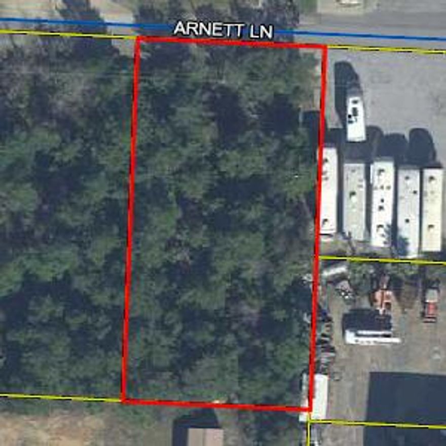 Location, location, location! Vacant land, minutes from the white sand beaches of the Emerald Coast and amenities. Lot is wooded and zoned residential, ready for your dream home or investment property. The lot beside it is also available and could be combined: 59 Arnett Lane.