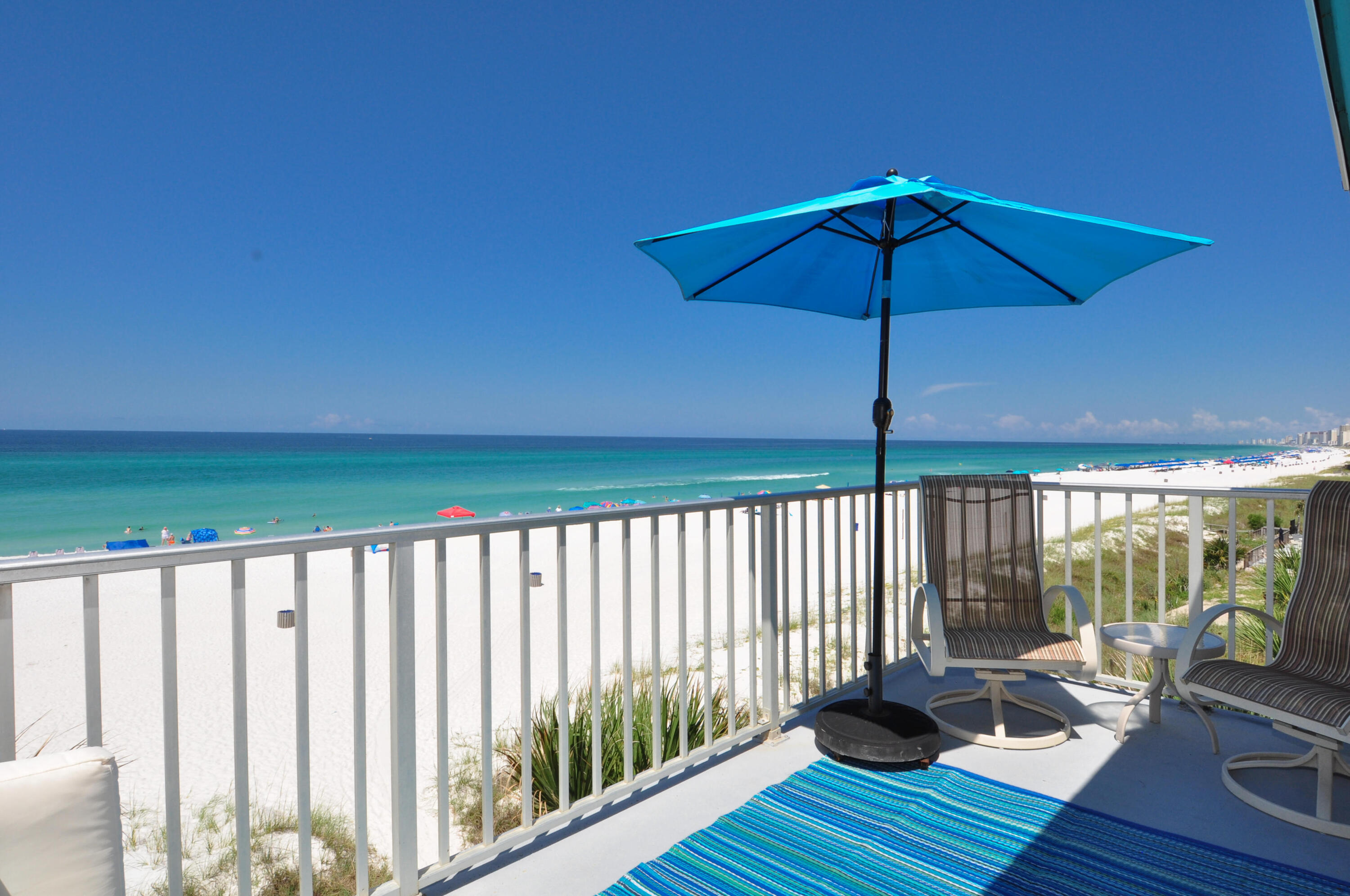 Million dollar view!!! This corner unit Nautical Watch condo has been recently upgraded to a full 2BR/2BA and is being sold furnished. Recent updates include luxury plank flooring throughout, vaulted wood plank ceiling in the living area, all stainless steel appliances including a Fisher Paykel 2 drawer dishwasher, granite counter tops, convertible dining and coffee tables, and extra surprise storage! This unit has not been on the rental program for the last five years, but it could be a great income producer since this complex is highly desirable due to location. Nautical Watch is just 5 minutes from many restaurants, family-friendly entertainment spots, and St. Andrews State Park! Get ready to enjoy the most beautiful sunsets over the Gulf of Mexico!