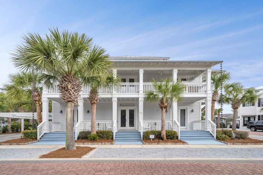 Situated on a prime CORNER location, this home is an idyllic setting for everyday living and entertaining or for a vacation rental/investment property. This home exudes Florida elegance, communicated through beautiful finishes, superb craftsmanship and decadent amenities. 4 bedrooms plus 4.5 bathrooms are spread across three floors and  THREE expansive porches that run the length of the home! Inviting, light-filled rooms welcome you, while the home's coastal chic ambiance suggests casually elegant living and entertaining in all seasons. This beautifully designed Caribbean style home has high end finishes throughout including: 10' ceilings, 8' doors, triple crown molding, a gourmet kitchen with state of the art appliances (including gas stove), custom window treatments, hardwood floors,