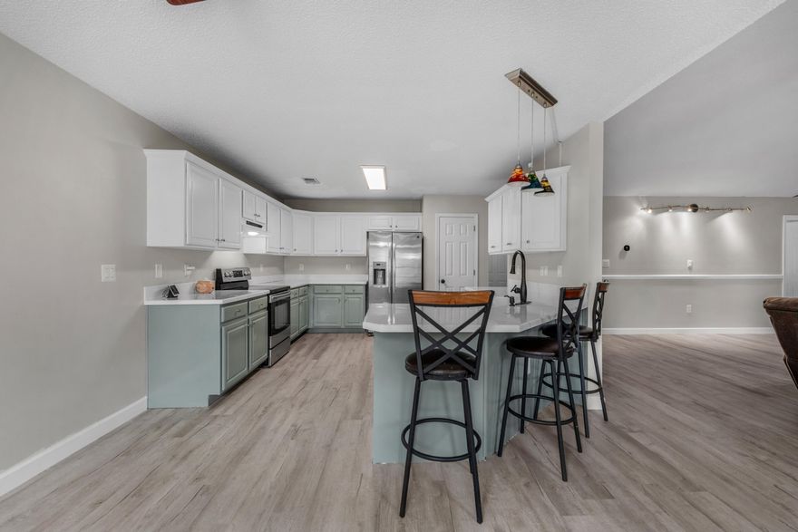 NEW Price and NEW Pics! The Kitchen had a major makeover. You are not going to want to miss this beautiful home, perfect for you and your family. Hate neighborhood traffic? This home is located in a cul-de-sac. Love big yards? This home sits on a little over a quarter acre. Love updates? Here's a few... Roof and Gutters 2023, Water Heater 2021, HVAC 2022, and LVP flooring 2023. Additional updates in the last month include resurfaced counter tops, painted cabinets, other paint touch ups and new baseboards. How about storage? No problem with that with 2 sheds and a LARGE workshop; perfect for all your project needs, ''She Shed'', or ''Man Cave''. Not to mention the beautiful open kitchen connected to the dining area and overlooking the large living room.