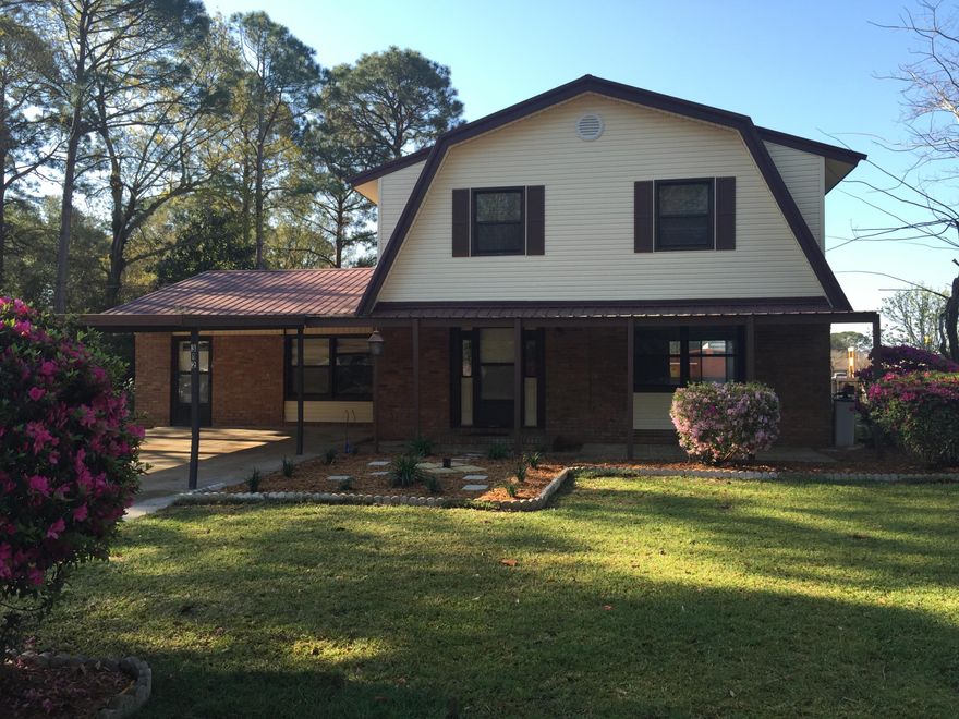 You have found it! A home in Fort Walton Beach for less than $70/sf. Enjoy the wonderful functionality of a 2700+ sf floor plan with a mother-in-law suite nestled in the back. Expansive yard offers endless possibilities. The first floor features all tile, a formal living area, as well as a huge bonus room for family get togethers. The kitchen is a great space for entertaining guests. Upstairs features 3 Bedrooms with real wood floors, and 2 baths. The downstairs mother in law suite features one bedroom a bathroom, a kitchen, and living area. Perfect for guests on an extended stay! Call today before this one is gone! You will be sorry.