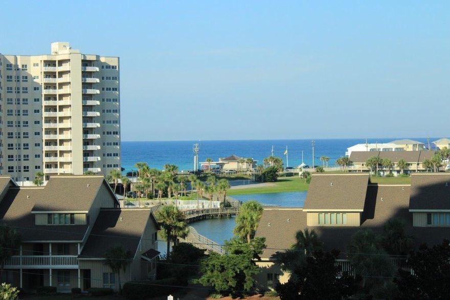 Awesome views of the Gulf Of Mexico and Stewart Lake in sought after gated Seascape Resort! Enjoy the sunsets in this South facing 2 bedrm, 2 bath, W/ bonus Bunkie rm for extra lodging. Literally 2 min walk to sugar white sands, emerald green waters & private beach access is what the Doctor ordered. Centrally located to all the conveniences within walking distance or just a few blks you have Silver Sands Outlet Mall, Shopping & Restaurants galore. Plus an 18 hole golf course right on the premises along W/ Cabana Cafe Restaurant, tennis cts, fitness rm, 3 swimming pools, bike rentals & conference center. Home is great for entertaining W/ open concept floor plan views of the Gulf from most of the unit. Whether you call it home or use it as an investment W/ rental projections 35k+ great value