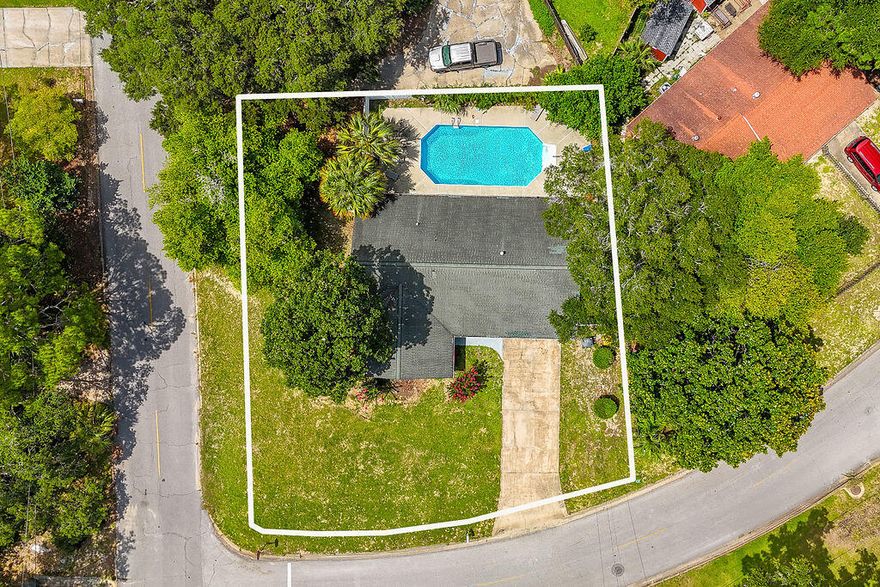 Great New Listing! Pool Home on Large Corner Lot! Welcome to your next home! Nestled on a spacious corner lot in a well-established neighborhood, this beautiful 4-bedroom, 2-bath home is ready for summer fun with its sparkling in-ground pool and multiple inviting living spaces. Inside, you'll find two large living areas, perfect for relaxing or entertaining. The bright and airy family room at the back of the home features huge windows with views of the pool and backyard--bringing the outdoors in with abundant natural light.  Updates include: LVP in Living Rooms; Tiled shower in guest bath; interior completely repainted; painted brick exterior; PVC Fence; New Outside Electrical Panel.  Major systems:  HVAC 2022; HWH 2004; Roof 2007 (Seller to replace roof prior to closing). This home also has a full 2 car garage.  Schedule your tour of this home and see all that it has to offer...