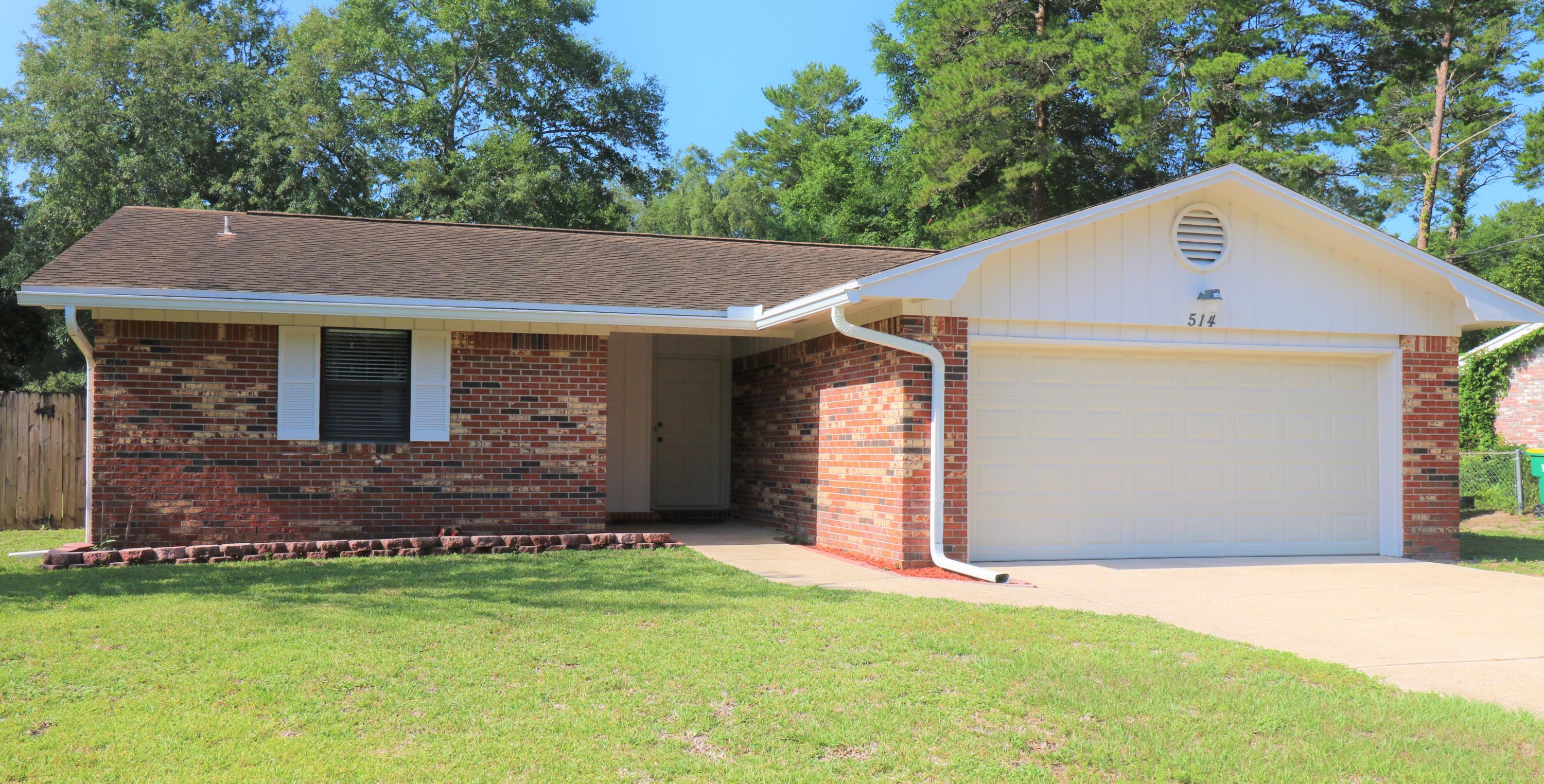 Updates galore! This beautiful move-in ready brick home is definitely an eye-catcher. It's meticulously manicured inside and out. Both bathrooms are new and modern. New, luxury, vinyl plank, lifetime warranty flooring throughout all home but kitchen. More NEW updates: granite countertops, paint (inside and out) flat surface ceilings, 6-panel solid core doors with E-Z grip door levers that have antimicrobial technology. French doors lead to the 29x12 covered porch in the back. Bonus: gutters. fenced back yard, storage building with concrete patio and floor, and an attached 2 car garage.