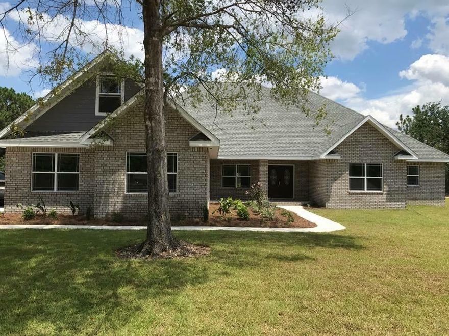 ENTERED FOR COMPS PURPOSES ONLY. Custom built by Wilson Enterprises on a 1.3 acre lot. Tons of upgrades. 10' ceilings in living & master, 9' in other areas. Kitchen features all wood cabinetry with upgraded black stainless appliances; 36''x60'' island, huge butchers pantry, under cabinet lighting. Wood look tile in main living space, porcelain tile in kitchen and baths. Granite throughout. Bath 1 has double vanities and tiled shower, bath 2 is connected to front bedroom with tiled shower. Master jetted tub & walk in shower both tiled. Sodded yard with sprinkler system. 3 car garage, upgraded insulation, room above garage is partially finished.