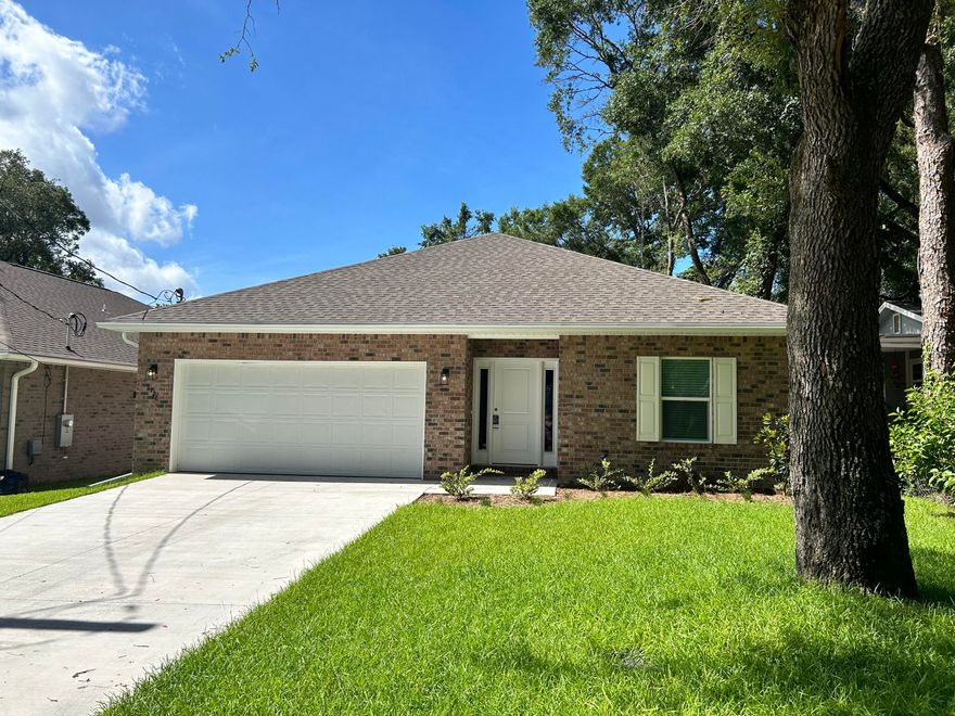 **BUILDER IS OFFERING $7500 TOWARDS CLOSING COSTS with a full price offer!** Welcome to the epitome of modern living! This newly constructed 4 bedroom, 2.5 bathroom home is a masterpiece of design and craftsmanship. Nestled in the heart of Niceville, this residence offers a perfect blend of contemporary style and practical functionality. The open-concept layout seamlessly connects the living, dining, and kitchen areas, creating a fluid space for everyday living and entertaining. Retreat to the master suite featuring large shower and dual vanities. The walk-in closet provides ample space for your wardrobe. Enjoy outdoor living in your private backyard retreat. Whether you're entertaining guests or unwinding after a long day, the fully fenced yard and covered patio area is the perfect extension of your living space. Conveniently located near Niceville's city hall, library and pickle ball courts, this home offers easy access to schools, Eglin AFB or I-10  making it an ideal choice for those seeking a perfect balance between luxury and convenience. Don't miss the opportunity to make this brand-new construction your forever home.