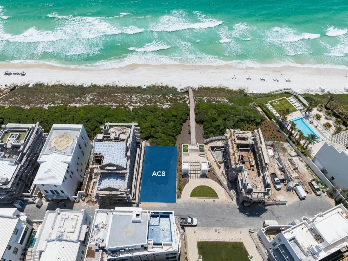 Perfectly positioned along the pristine white sands and emerald waters, Homesite AC8 represents one of the last remaining opportunities to craft a legacy residence in one of the most exclusive enclaves on Scenic Highway 30A. This homesite is prominently located adjacent to the direct beach access of the Bela Gray Green Beach Access and the Bela Gray Green Park, offering unobstructed, sweeping panoramic views of the Gulf and the rare chance to design a custom home that embraces both the refined architecture and coastal serenity that define life at Alys Beach.