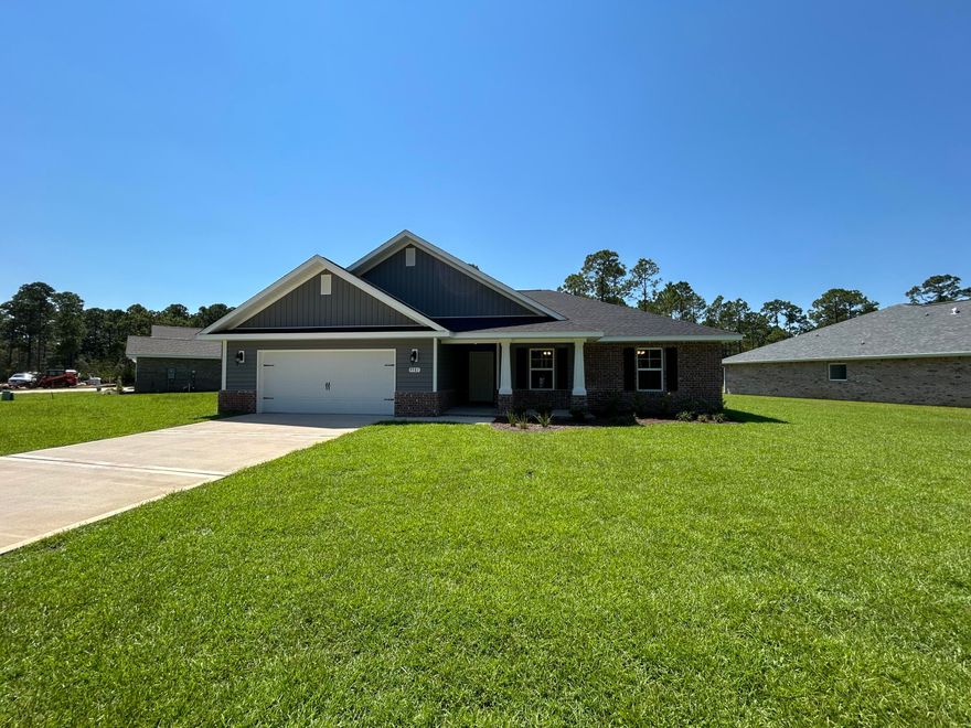 4 Bedrooms 2.5 Baths *2 CAR GARAGE * Covered Entry * Laminate flooring throughout Except Tile in Master Bath & Carpet in Bedrooms * Master Suite Features: Builder's Signature Zero Entry All Tile Walk in Shower, Separate Soaking Tub, Double Vanities & Huge Walk-in Closet  *Kitchen Features:  Granite Countertops,  Large Island, White Shaker Style Cabinets, Stainless Steel Appliances & Walk in Pantry * Breakfast Cafe  *Covered Rear Lanai * 2x6 Exterior Construction * Builder Warranty Included *
