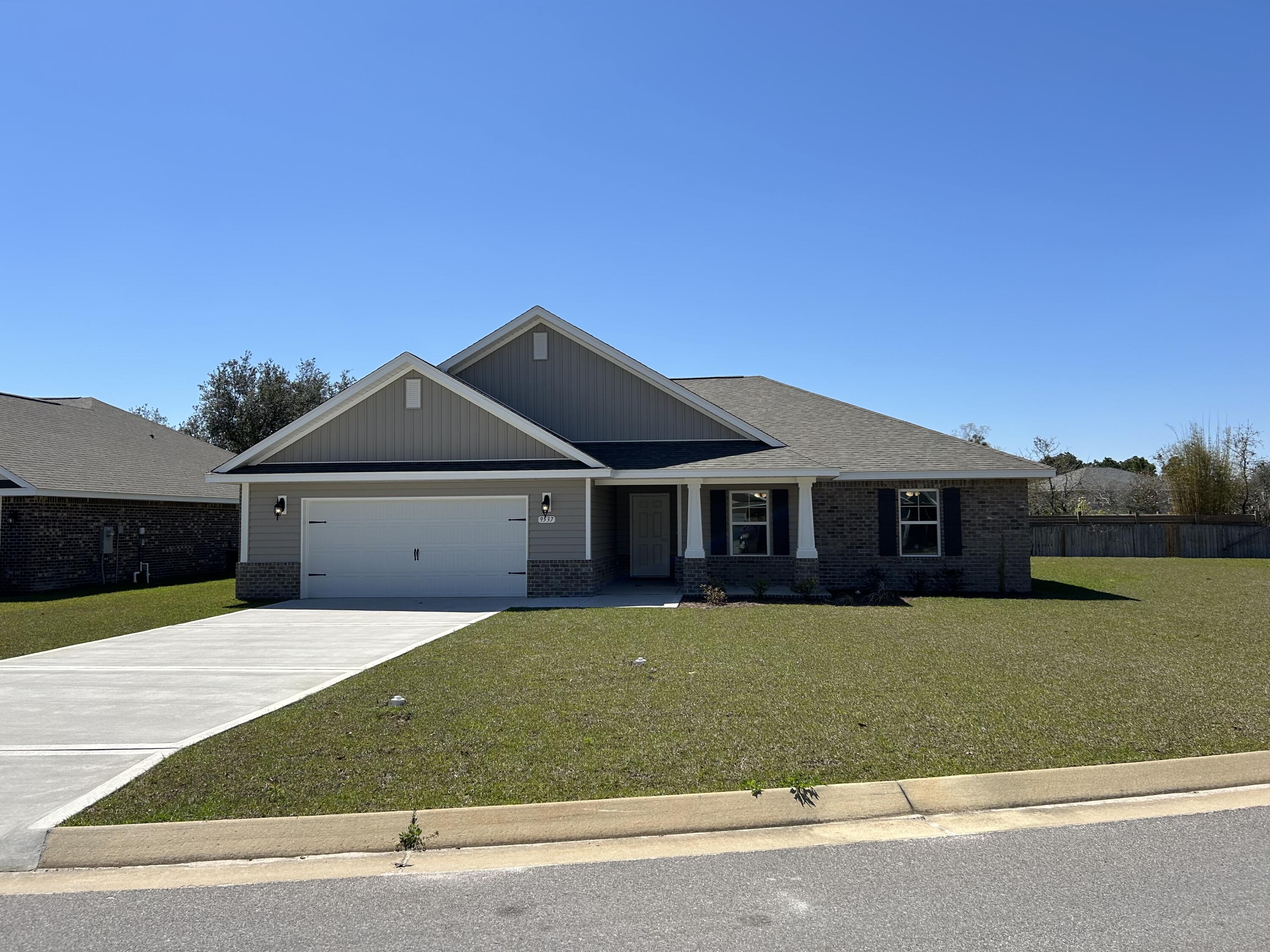 4 Bedrooms 2.5 Baths *2 CAR GARAGE * Covered Entry * Laminate flooring throughout Except Tile in Master Bath & Carpet in Bedrooms * Master Suite Features: Builder's Signature Zero Entry All Tile Walk in Shower, Separate Soaking Tub, Double Vanities & Huge Walk-in Closet *Kitchen Features: Granite Countertops, Large Island, White Shaker Style Cabinets, Stainless Steel Appliances & Walk in Pantry * Breakfast Cafe *Covered Rear Lanai * 2x6 Exterior Construction * Builder Warranty Included *