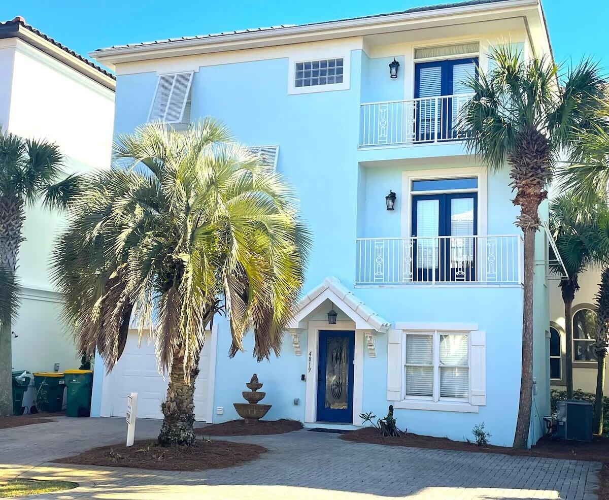Welcome to Good Tides, the quintessential beach getaway that boasts an impressive 9.8 Stars from 86 glowing reviews! This gem of a home is not just a property; it's a labor of love from a family that has poured their heart and soul into creating the ultimate short-term rental experience. Nestled in a gated community, you'll find yourself just a stone's throw away from the sun-kissed beach and a refreshing community pool. With four spacious bedrooms, three full baths, and two half baths, there's ample room for family gatherings or a friendly reunion. The second-floor kitchen, adorned with sleek Frigidaire appliances and abundant counter space, is perfect for culinary adventures, while the adjoining dining area comfortably seats eight, ready for lively meals and laughter. Step out on the balcony to enjoy al fresco dining at the high-top table or fire up the 5-burner gas grill for a barbecue under the stars. The cozy living room, featuring a massive 75' flat-screen TV and a gas fireplace, sets the stage for unforgettable family movie nights. Each bedroom is a sanctuary of comfort, equipped with either queen or king beds, and the two third-floor bedrooms boast luxurious ensuite bathrooms. At Good Tides, every detail is designed to make your new home not just enjoyable, but truly memorable.