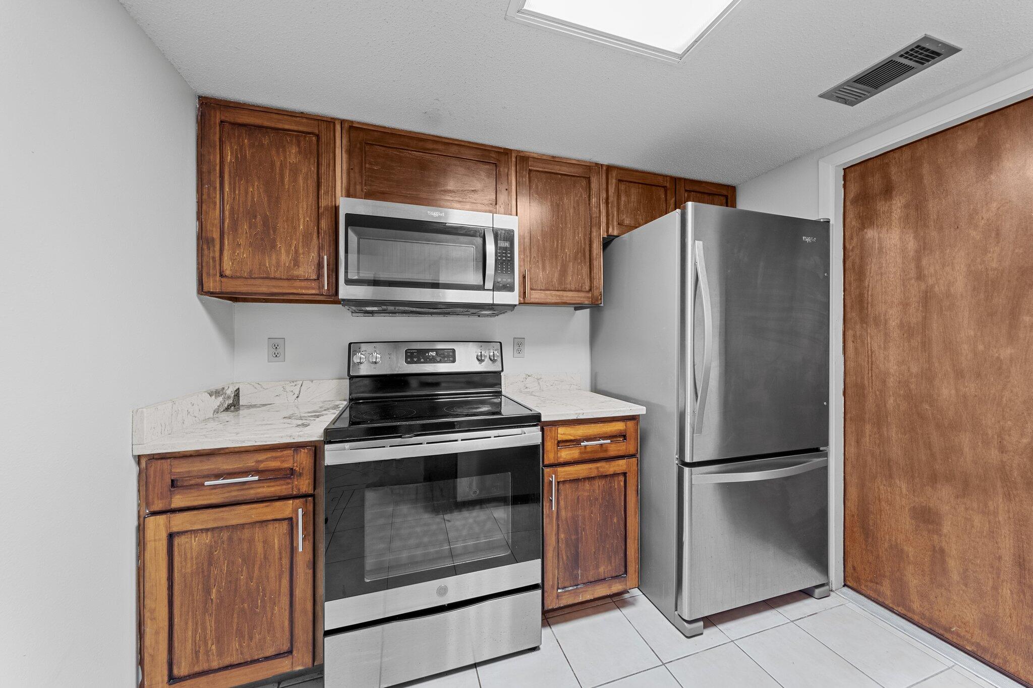 This one story home with attached garage just a few minutes from Hurlburt, Eglin, and our amazing beaches. No stairs. Interior was freshly painted. Trey ceiling and walk-in closet in primary bedroom, which opens onto deck with Trex decking in the rear of the unit. Updated kitchen and baths including updated appliances countertops and vanities. Kitchen has built in pantry. Tile flooring in main living areas and baths. New carpet in both bedrooms. Washer and Dryer connections in the garage.