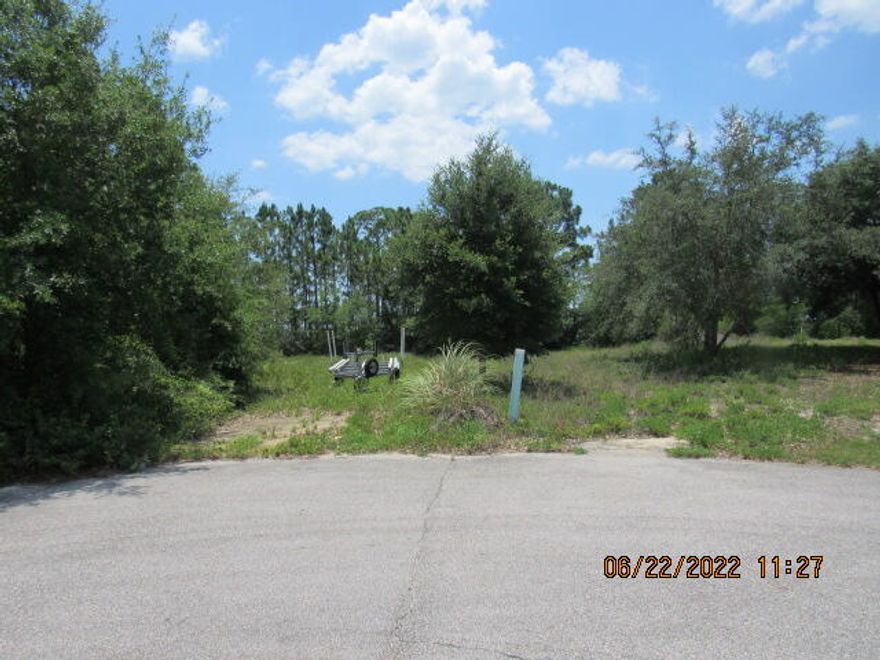 New survey just completed! Lot is vacant and located on the cul-de-sac with water views of the intercoastal waterway. HOA fees are $235 per year and are voluntary for access to private beach and dock area.  All information deemed important should be verified by buyer.