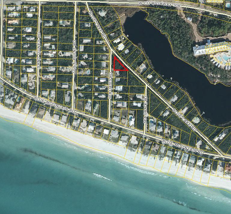 Beautiful corner lot in desirable Blue Mountain Beach Subdivision. South of 30-A, this lot is VERY close to the beach with lake and beach access. These lots rarely come on the market. Blue Mountain Beach S/D has no build-out requirements and no association fees.New county Dune Lake rules now allow building footprint/impervious surface on fifty(50)% of the area inside the 300 ft. Dune Lake Preservation Area. Beautiful lot in a beautiful location!!!