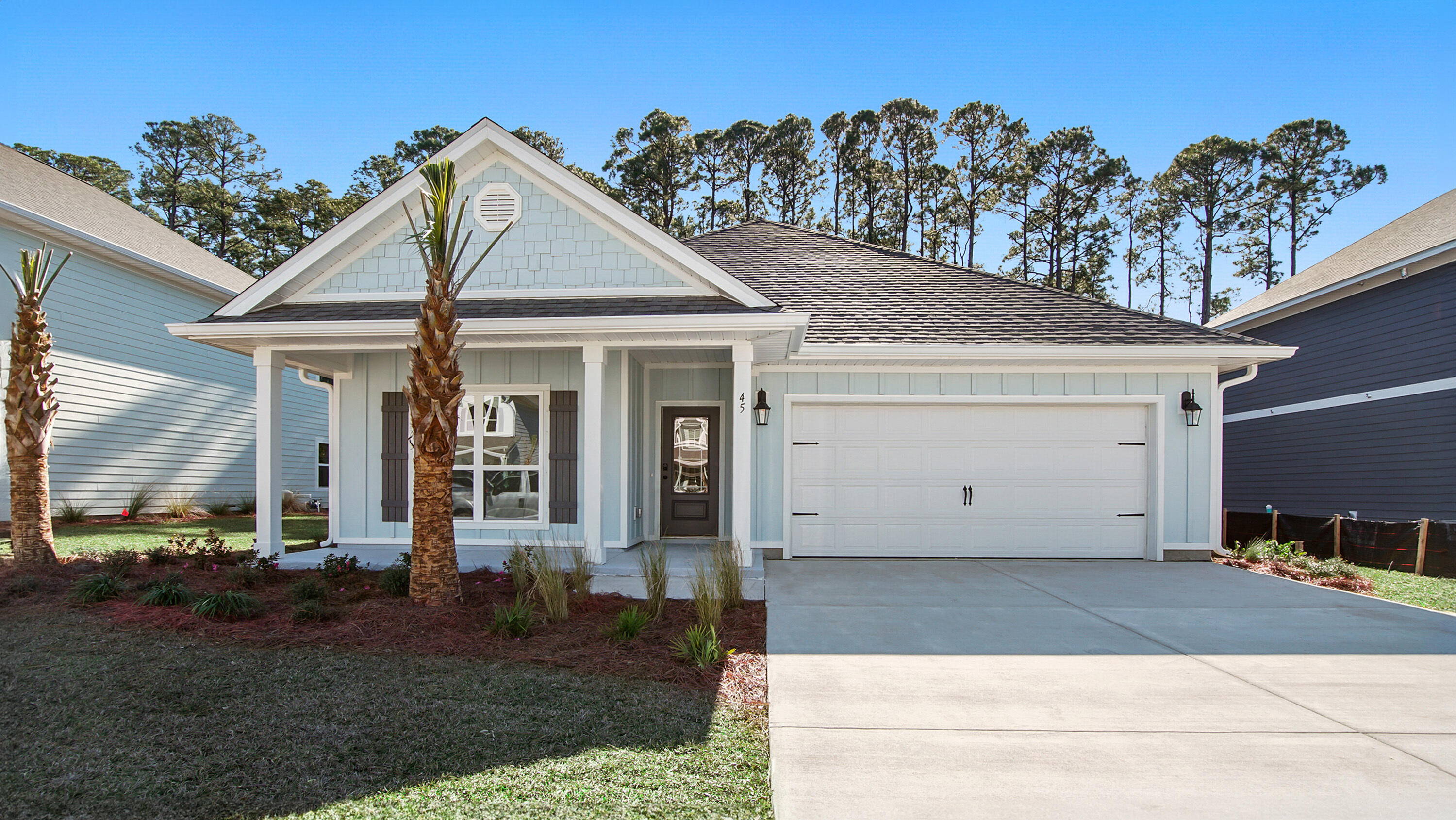 The Rhett is a one-story, four-bedroom, two-bathroom home with over 1,700 square feet of living space. All three guest bedrooms are located in front of the home. The kitchen is located at the center of the open living space that flows directly into the dining and living area. A large island with bar seating is centered in the kitchen which features ivory painted Shaker-style cabinets, quartz counter tops, and a large walk-in pantry. The primary bedroom is split from the three guest bedrooms in the back of the home. The primary en-suite is complete with a stunning tile shower with a glass door, separate soaking tub, a dual-sink vanity, and an oversized walk-in closet.