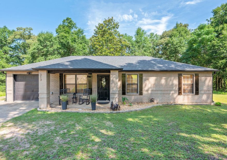 Don't miss this move-in ready gem ! This 3 bedroom , 2 bathroom home sits on a spacious .47 -acre lot and even includes a custom treehouse-perfect for outdoor fun. Inside, enjoy stylish LVP flooring throughout, warm butcher block countertops, shiplap accents in the bathrooms, and custom floating shelves. The living room features a beautiful wood beam, and the kitchen boasts a custom vent hood. Thoughtful updates include modern fixtures, vanities, tile flooring, mirrors , and faucets. Major systems to include a New Roof 2021, NEW dishwasher 2025 and HVAC updated in 2017. Located in N Crestview with easy access to local bases, shopping, and Florida's stunning beaches. Call today to schedule your tour or bring your favorite realtor!