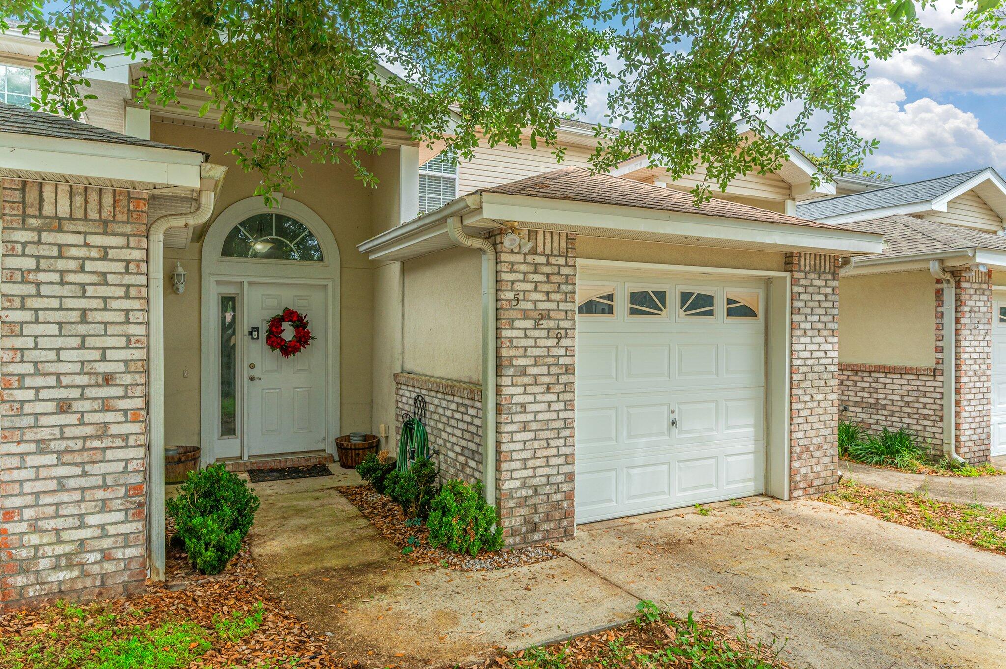 Welcome to this perfectly sized 2-bedroom, 2.5-bath townhome, ideally located in the heart of Fort Walton Beach. Whether you're a first-time homebuyer or an investor, this charming property offers comfort, convenience, and character. The spacious first floor features a large living area and an open dining space that flows seamlessly into the kitchen--perfect for entertaining. Hardwood flooring and tile on the main level make for easy upkeep, while newly installed luxury vinyl plank flooring on the stairs and throughout the second floor ensures low-maintenance living throughout the home. The lush, English garden-style backyard offers a peaceful retreat, and soaring ceilings open to the second floor, enhancing the cozy yet expansive feel. Upstairs, two generously sized bedrooms each offer private en-suite bathrooms, with the primary suite featuring a walk-in closet. Natural light fills the home through abundant windows, and the one-car garage adds privacy and convenience. Complete with a covered front porch and located just a short drive from the stunning Emerald Coast beaches, this townhome is a must-see!
Roof 2019