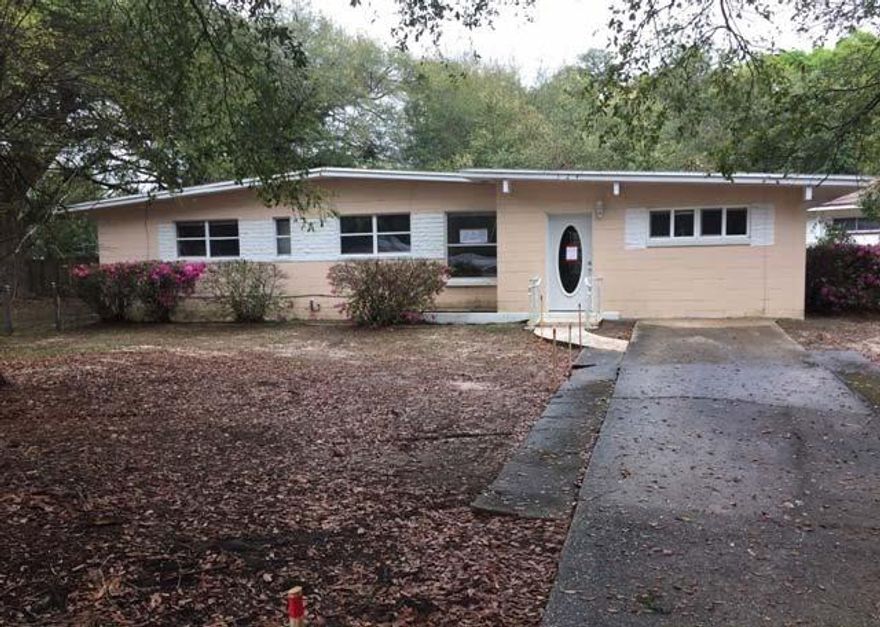 REO - Charming 3 Bed, 2 Bath home located in the community of Fairfax Terrace. Featuring tile & carpet flooring throughout, an Eat-In-Kitchen & a separate Dining Room/Family Room. Also featured is a very spacious backyard w/Beautiful mature trees & shrubbery! Don't miss out on this Wonderful Opportunity! Property is Insurable condition; There are no repairs called out by appraiser; Property will qualify for an FHA Loan in current condition; IN.