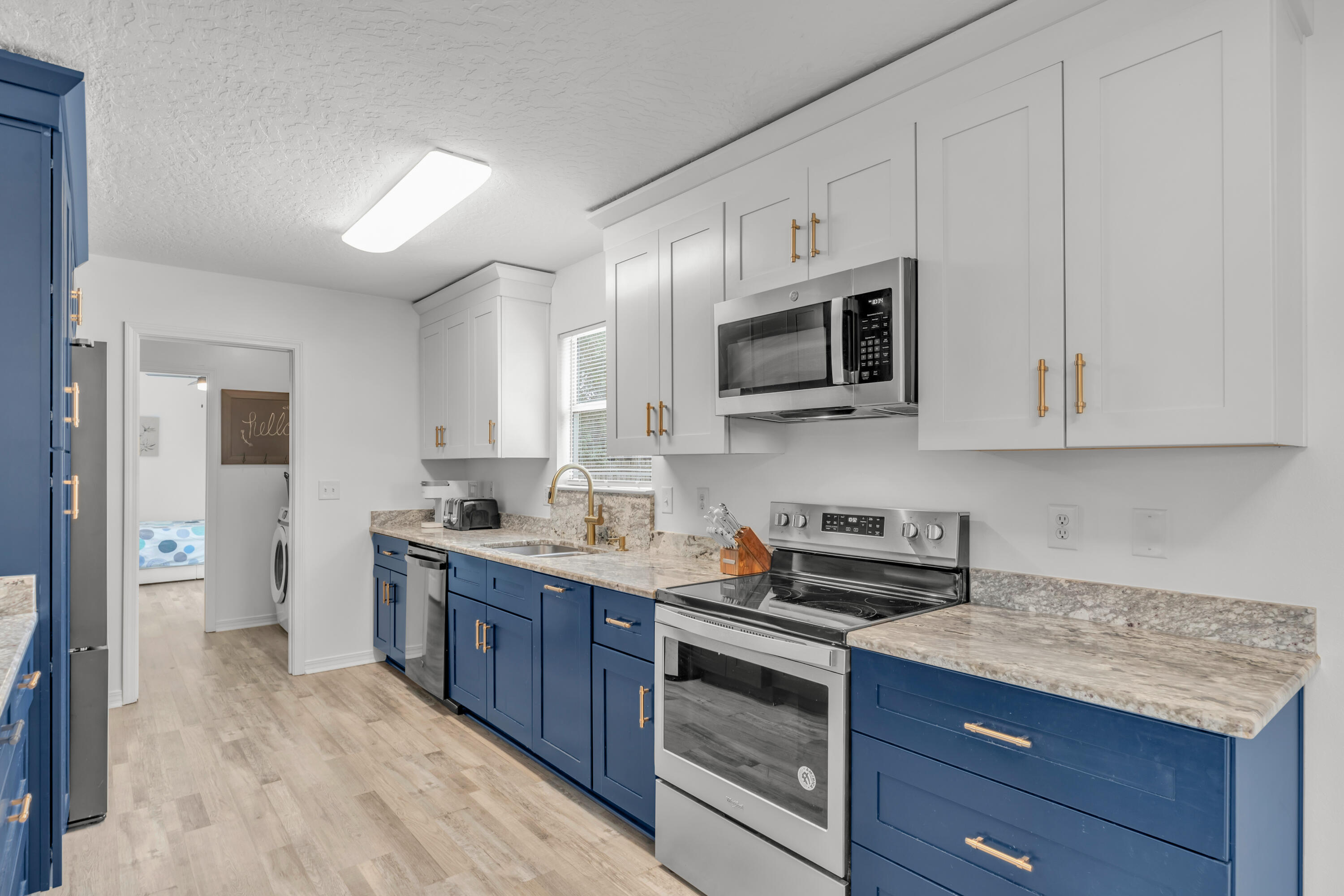 $20,000 PRICE DROP!! Welcome to your dream home or next turnkey Airbnb! This home is on a stunning corner lot, offering 0.57 acres of both privacy and potential. The lot contains a separate shed area and another open lot that another residential home can be built on. Pour concrete, add utilities, and turn your home into an income-producing asset. This luxurious single-family residence boasts a thoughtfully designed split floor plan, fresh paint, and new fixtures throughout. The 2021 roof, 2014 HVAC, and 2020 water heater ensure worry-free living. The Airbnb generated $50,000 in revenue over the past year. The furniture does not convey. Don't miss this rare opportunity to own a piece of paradise that truly has it all!