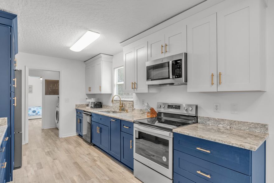 $20,000 PRICE DROP!! Welcome to your dream home or next turnkey Airbnb! This home is on a stunning corner lot, offering 0.57 acres of both privacy and potential. The lot contains a separate shed area and another open lot that another residential home can be built on. Pour concrete, add utilities, and turn your home into an income-producing asset. This luxurious single-family residence boasts a thoughtfully designed split floor plan, fresh paint, and new fixtures throughout. The 2021 roof, 2014 HVAC, and 2020 water heater ensure worry-free living. The Airbnb generated $50,000 in revenue over the past year. The furniture does not convey. Don't miss this rare opportunity to own a piece of paradise that truly has it all!