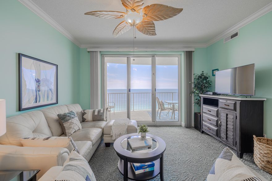 Welcome to Emerald Isle Unit 1507, a stunning 2-bedroom, 2-bathroom Gulf-front condo that perfectly blends modern upgrades with coastal charm. Nestled on the desirable west end of Panama City Beach, this exquisite retreat offers breathtaking views, upscale renovations, and a prime location just minutes from Pier Park, shopping, dining, and endless entertainment options. Step inside to discover a fully renovated kitchen designed for both style and functionality. This chef's dream boasts soft-close cabinets and drawers, elegant 42-inch-high upper cabinets, and two corner lazy susan storage areas with individual LED lighting. The new granite countertops and stylish backsplash complement updated stainless steel appliances, while extra outlets on the peninsula provide added convenience. Under- counter LED lighting and a dimmable ceiling fixture create the perfect ambiance for any occasion. Additionally, the cabinetry above the fridge includes pullout shelves for easy access, and the heavy-duty, extra-quiet garbage disposal ensures a seamless cooking experience. The open-concept living and dining area is adorned with all-new lighting and coastal-style ceiling fans, enhancing the airy and inviting atmosphere. Relax in the newly furnished living room, featuring a plush sofa and loveseat, ideal for entertaining or unwinding after a sun-soaked day on the beach. This unit just got a glow up with professional staging, bringing a fresh and stylish coastal vibe throughout. Floor-to-ceiling sliding glass doors lead to an expansive Gulf-front balcony, where an added electrical outlet makes it easy to enjoy your morning coffee while watching the sunrise or an evening cocktail as the sun sets over the horizon. Both bedrooms provide a tranquil retreat with ample space and comfort. The master suite boasts direct balcony access, allowing you to wake up to the soothing sounds of the ocean. The ensuite bathroom is well-appointed, ensuring privacy and convenience. The guest bedroom and additional bathroom offer comfortable accommodations for family and friends. For ultimate convenience, this unit includes an outdoor storage closet, perfect for beach chairs and gear, as well as a deeded parking space on the 3rd-floor parking garage. Additionally, ample parking is available across the street on the additional parking deck. Emerald Isle is a premier Gulf-front resort with an impressive array of amenities, including multiple pools, a relaxing hot tub, a fitness center, and direct beach access. Whether you're searching for a lucrative vacation rental opportunity or a private coastal getaway, Unit 1507 is a rare gem that offers both luxury and location in one breathtaking package. Don't miss the chance to own a piece of paradiseschedule your private tour of Emerald Isle Unit 1507 today!