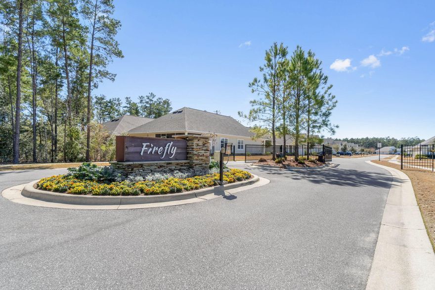 If serenity is what you crave, then you must tour 31 Dusky Way; a local artist's private retreat.. inspired by the colors of the emerald coast!!This home sits STEPS AWAY FROM FROM THE NEIGHBORHOOD POOL/PICKLEBALL COURT and boasts one of the largest floorplans in ''Firefly''.  The ''Dover Plan'' is a spacious 3 BR/2 bath.. PLUS FLEX ROOM known for extra storage and energy efficiency.The builder added a reinforced concrete foundation, weather-resistant exterior underwrap, and insulated energy-efficient windows. He also added EVP ''Birchwood'' flooring, a designer lighting package.. and upgraded trim/moldings to highlight the elegant 9 ft ceilings.The owners added to his vision...(continued) by continuing the EVP throughout the bedrooms, painting the entire home in a coastal color palette.. installing custom roman shades on all of the windows, 
and adding "coastal blue"  glass subway tile to the heart of the home.. the kitchen!

The kitchen features shaker-style white cabinetry, ss appliances and a gorgeous granite island; highlighted by brand new pendant lighting! There's also a large dining space; that will support large family gatherings.

The bedrooms are each tucked away in various parts of the home, ensuring privacy for all! Each bedroom is large, but the master suite is particularly spacious, with a HUGE CUSTOM CLOSET, and a well-appointed master bath.

The Master Bath offers a tiled 2-person shower with bench seating, and a separate garden tub. More premium granite featured in all bathrooms.

Since this home is owned by a local artist.. of course she wanted to add her own embellishments. Check out her version of the classic hall tree!

BONUS: Utility sink in the laundry room.. 2 more storage closets..  storage racks in the garage.. and SURGE PROTECTION FOR THE ENTIRE HOUSE!

Step outside... and you'll find a screened patio (with the quintessential southern ceiling fan), new landscaping, new wrought iron back yard fencing.. and a clear view of the "Firefly Amenities". 

Not only do you have private amenities offered in Firefly (clubhouse, pool, pickleball, and monthly yard maintenance), residents in this gated neighborhood also receive all of the Hammock Bay Amenities. 

Hammock Bay amenities include: Fitness Center,  Sports and Recreation Park, Tennis, Basketball, 3 additional pools, more than 10 miles of biking paths and walking trails, Nature Preserves, Bayfront Clubhouse with 500' dock, Lakeside Clubhouse, Food Truck Court, Old Fashioned General Store & Brewery, an "Event Stage" and CABLE! Yep! Cable is included when you purchase in Hammock Bay/Firefly.

So to recap... local artist's private retreat.. loaded with 1000's and 1000's of dollars in upgrades... sitting on a premium lot.. steps away from neighborhood amenities.. in a gated neighborhood.. where cable and lawncare service are included.. in one of the most highly sought after neighborhoods in the panhandle... is now available.. but not for long!!! Make your appointment today!

